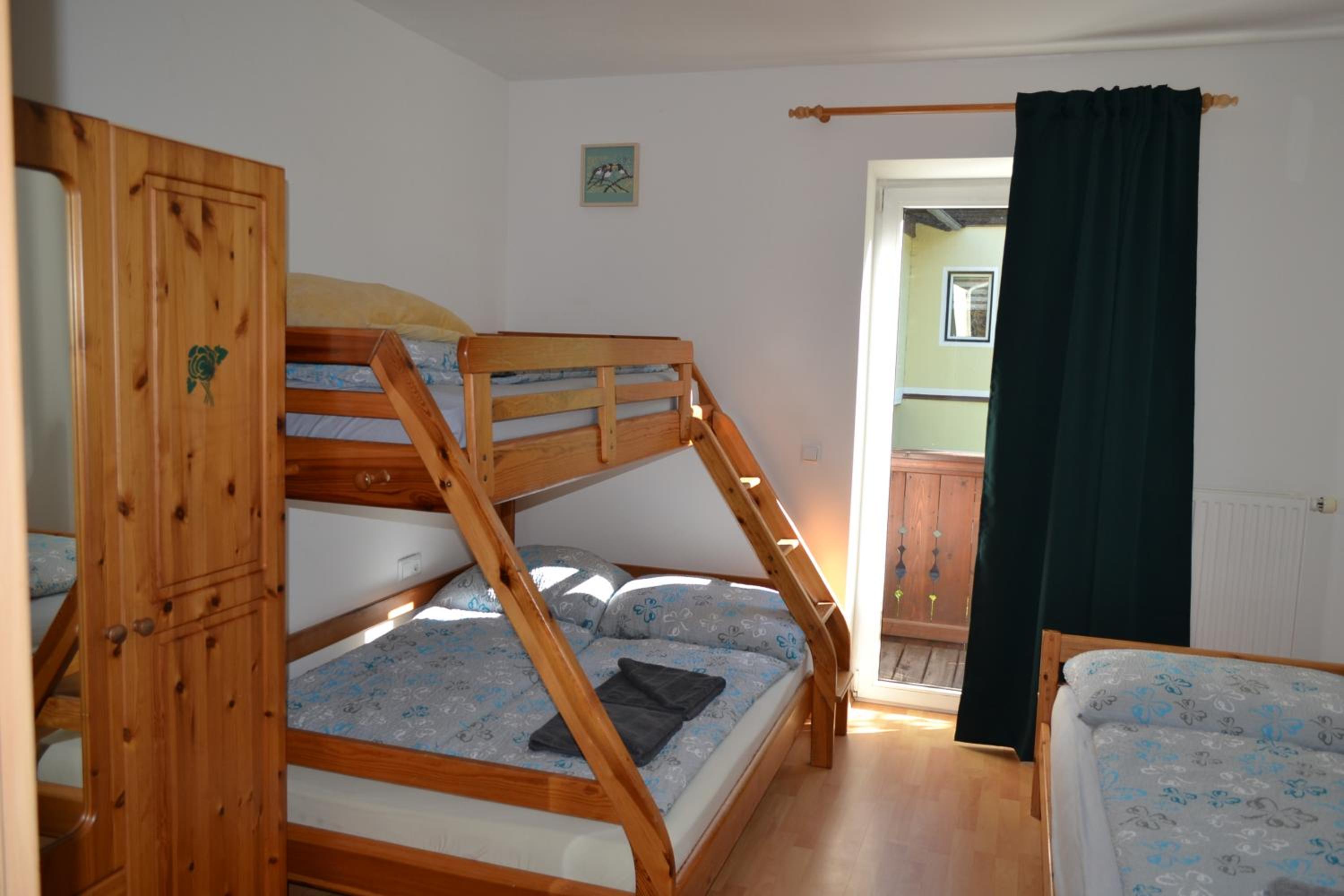 Three-Bedroom Apartment - Photo 18