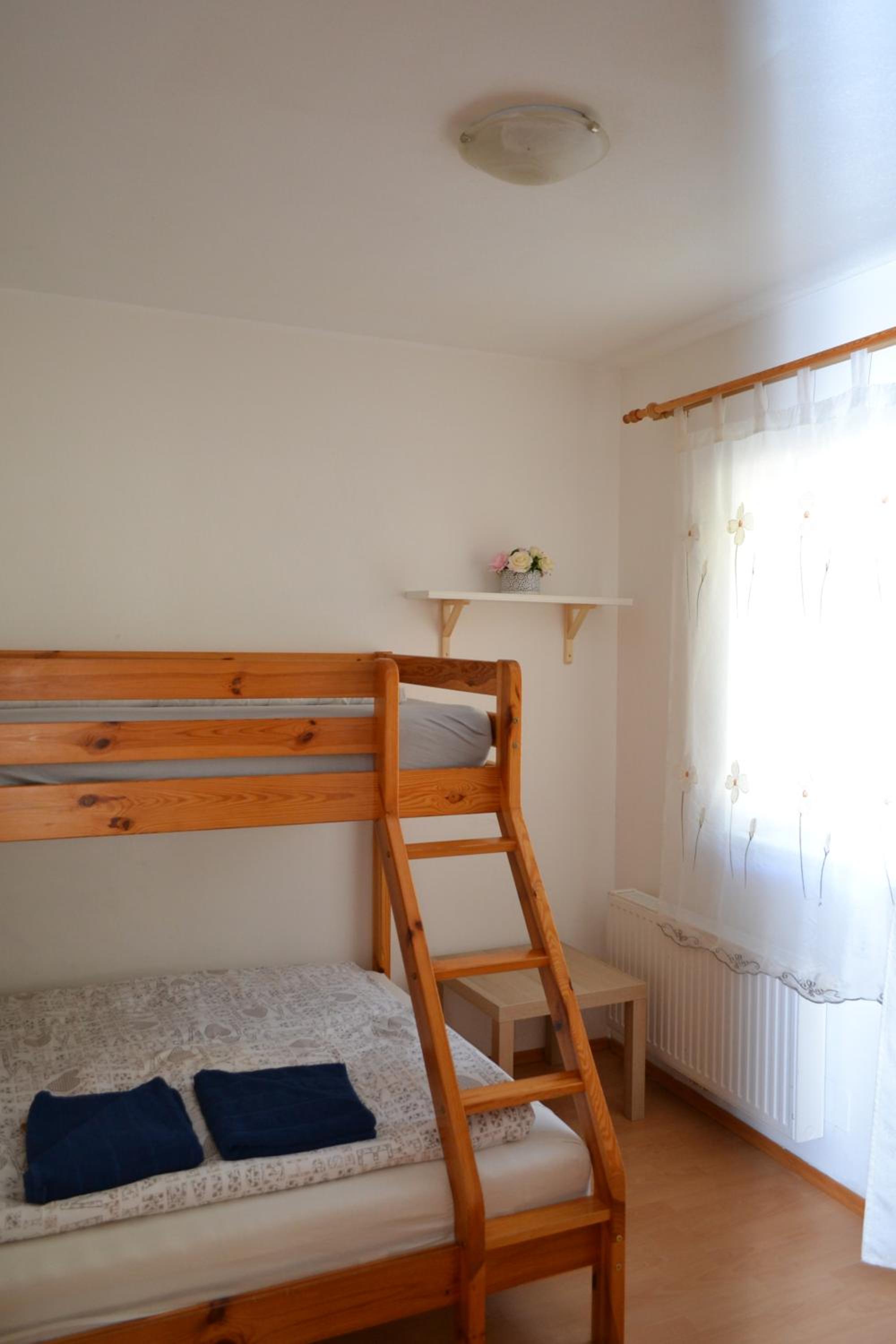 Three-Bedroom Apartment - Photo 26