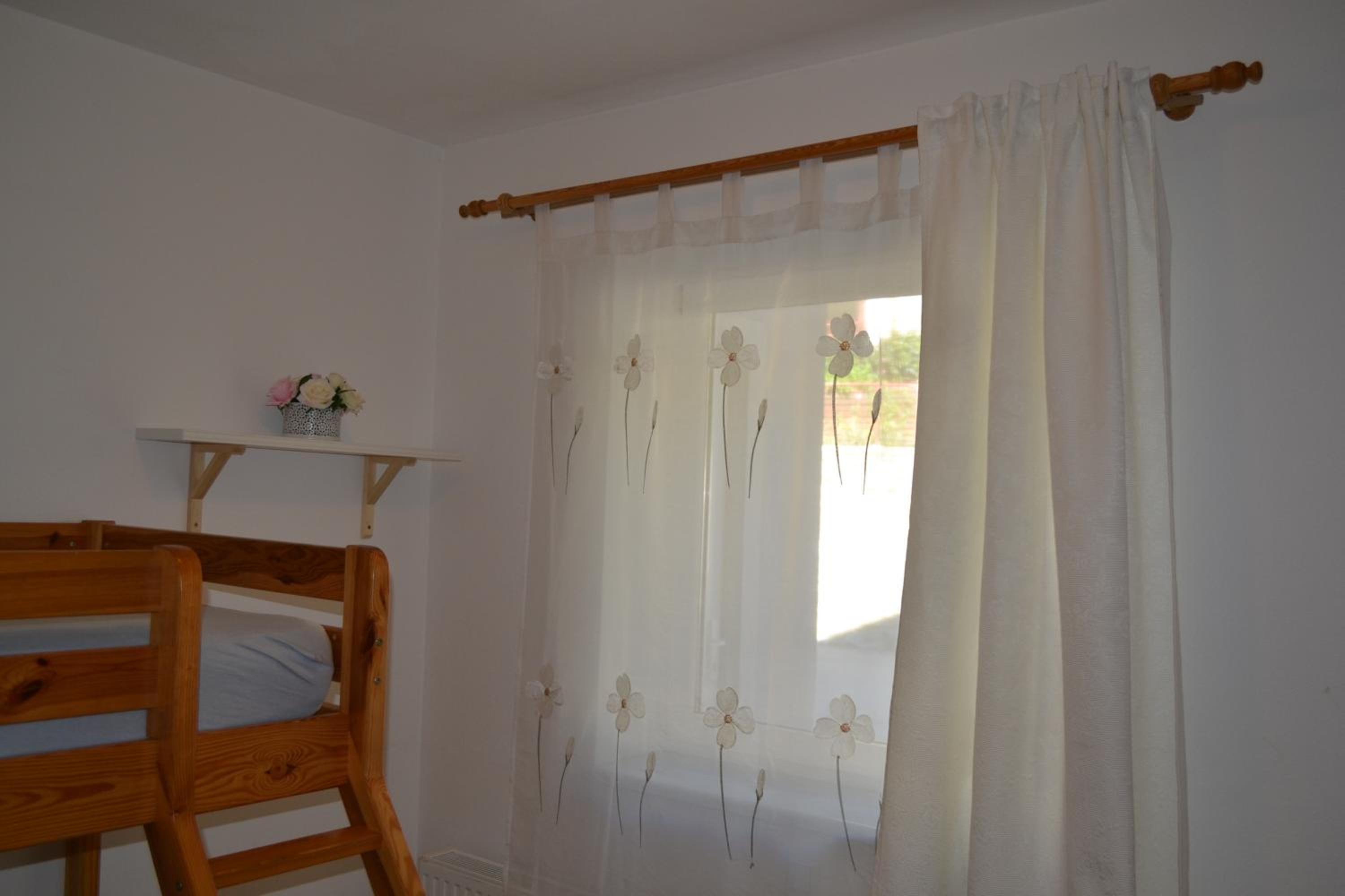 Three-Bedroom Apartment - Photo 25