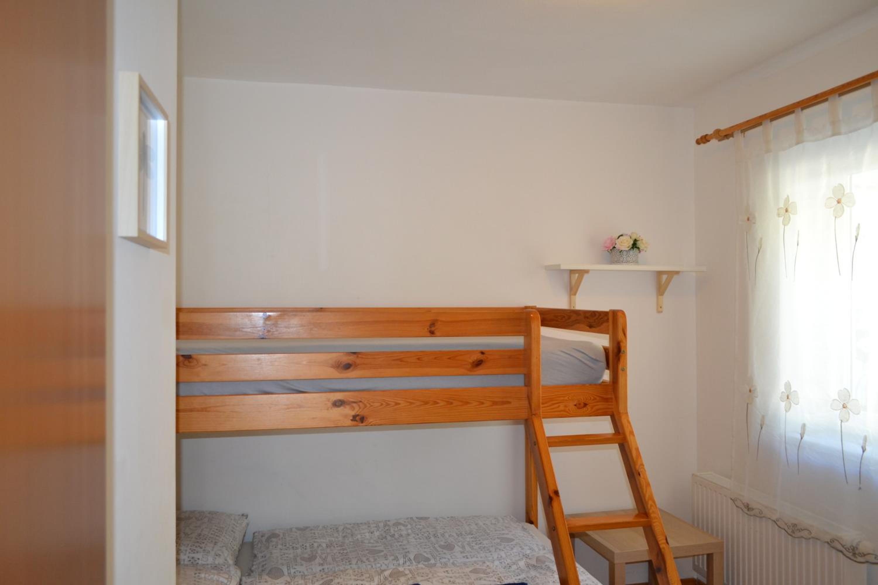 Three-Bedroom Apartment - Photo 24