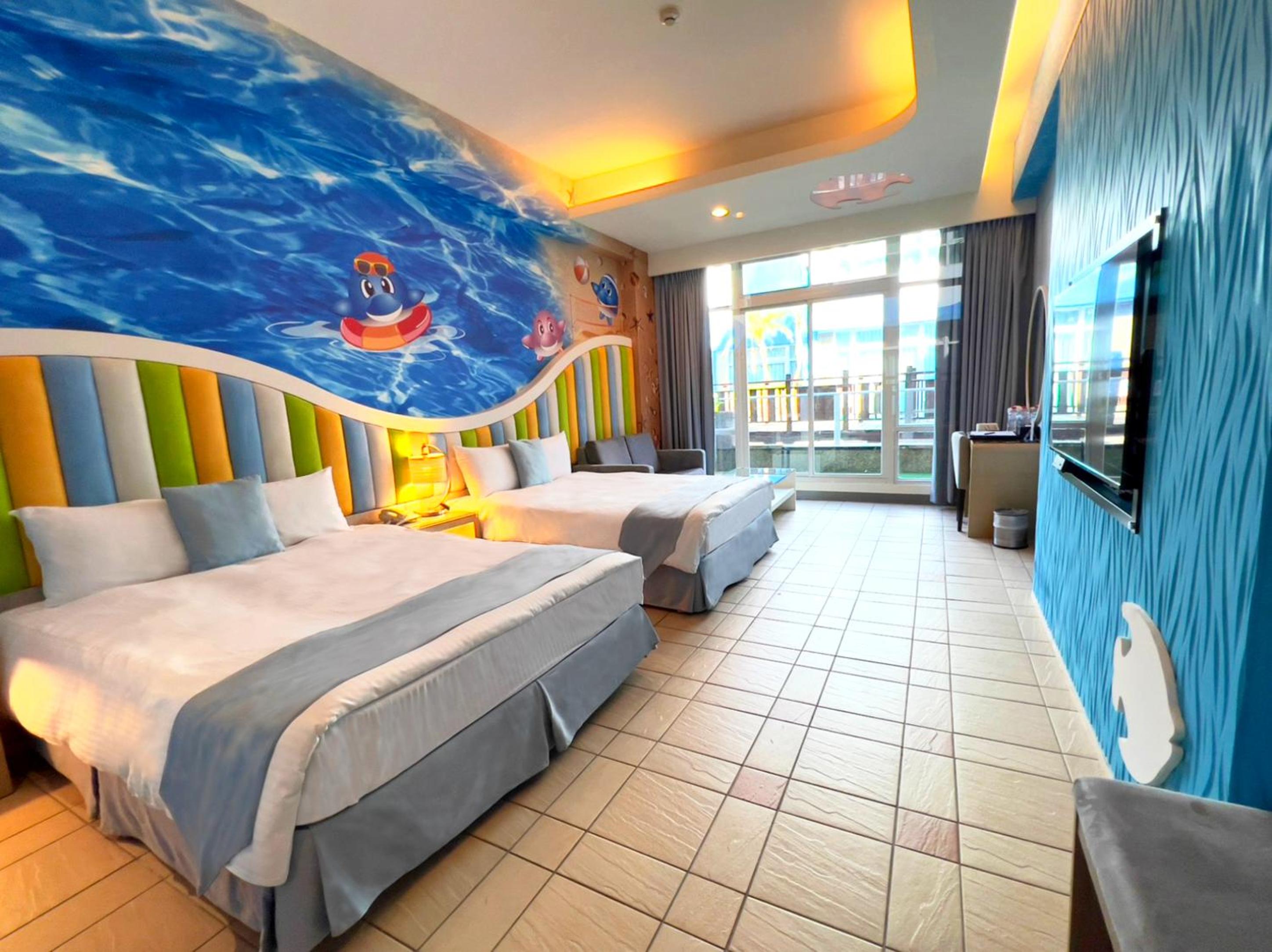 Ocean Themed Room With Balcony