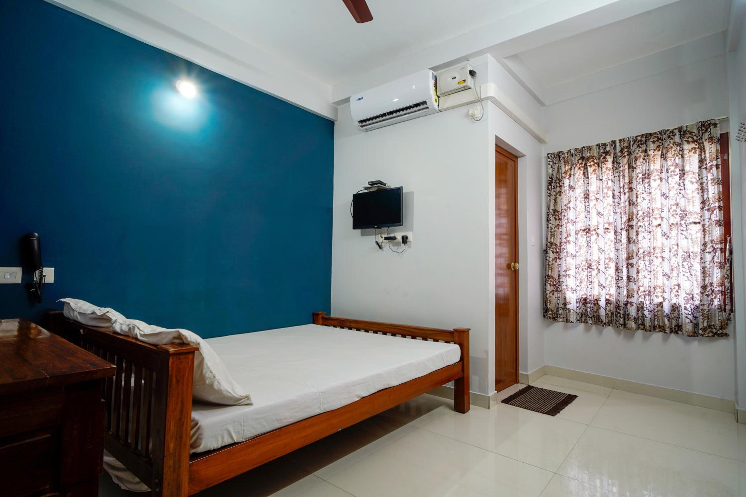 Deluxe Room - Photo 1