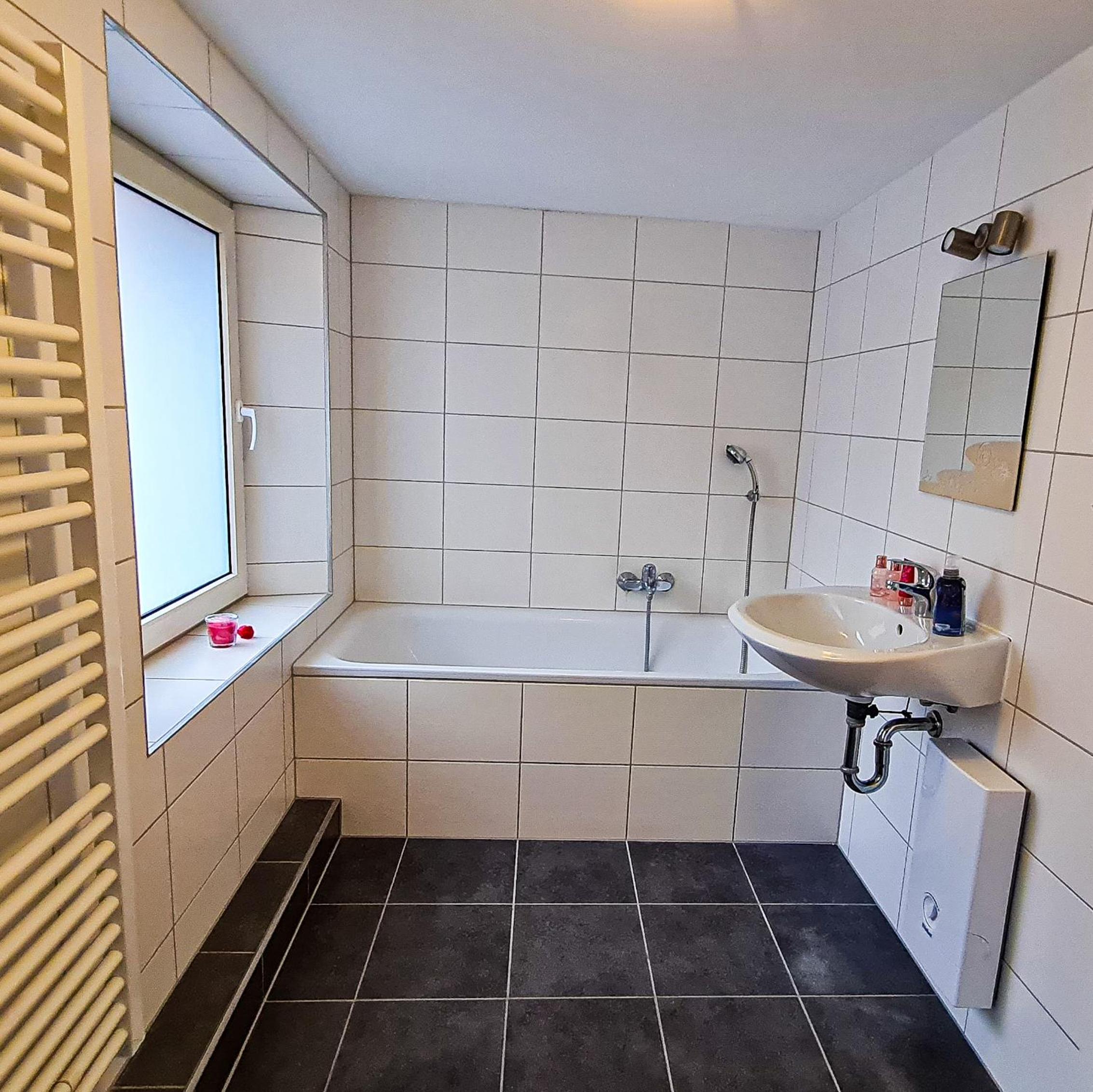 Three-Bedroom Apartment - Photo 12