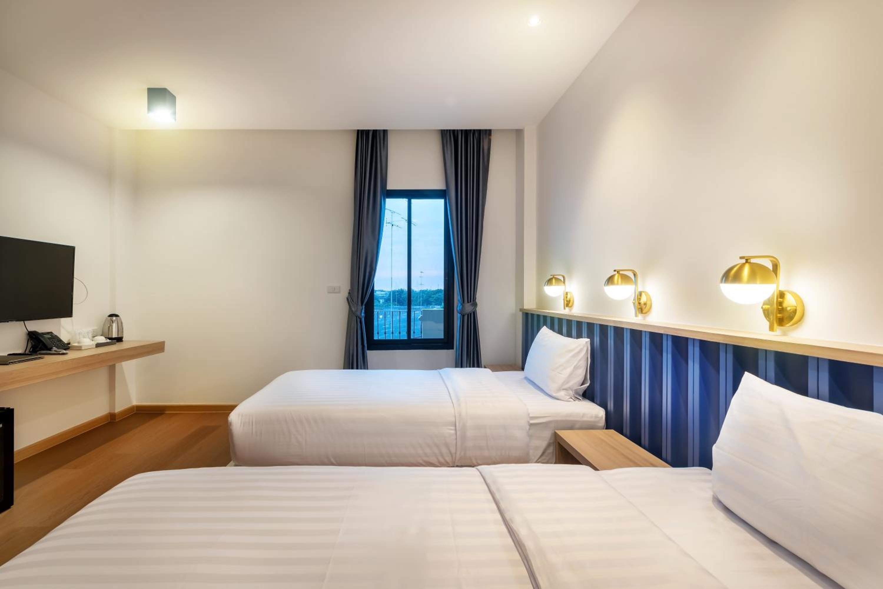 Deluxe Twin Room - Photo 7