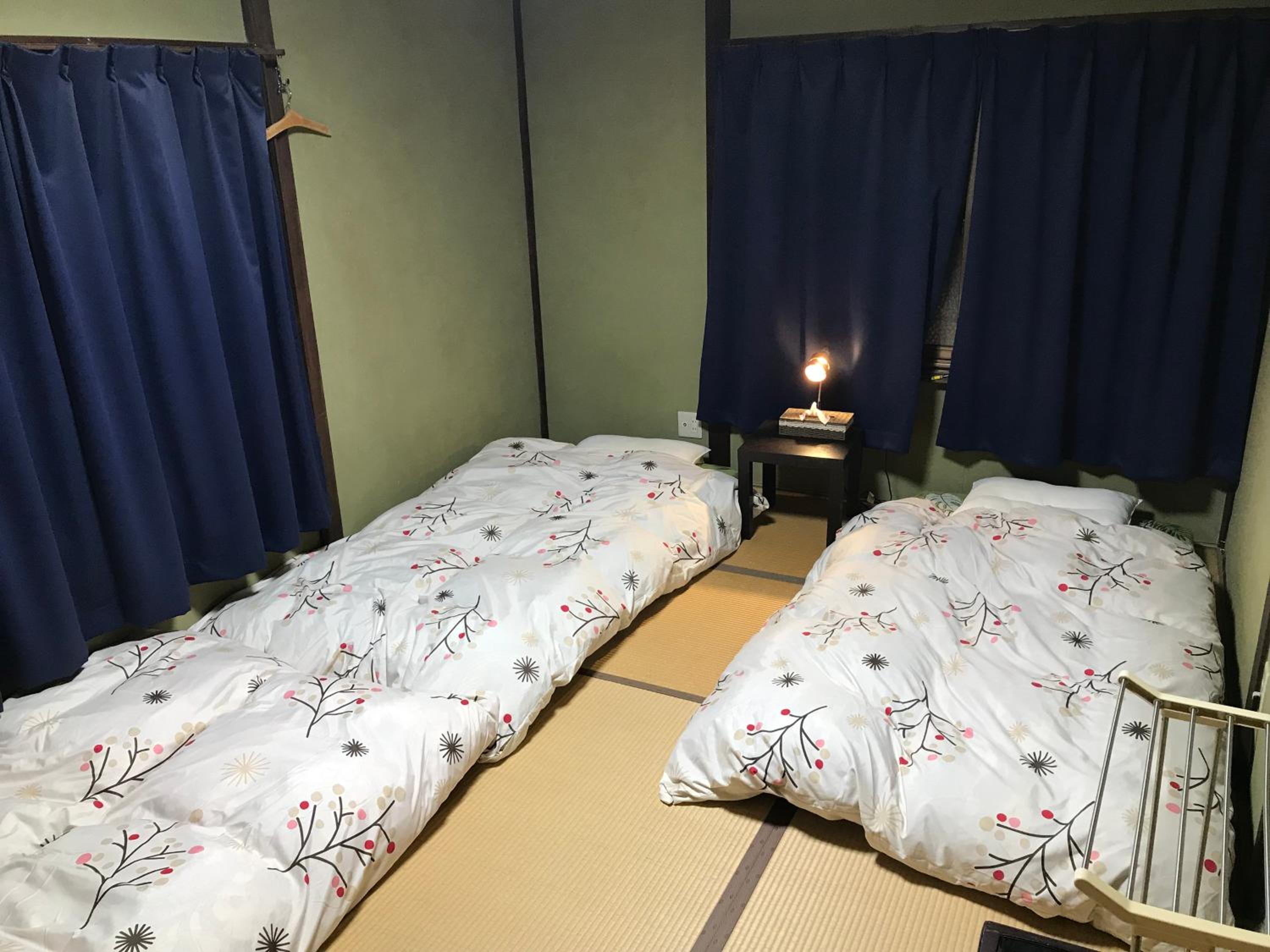 Economy Triple Room with Shared Bathroom photo 3