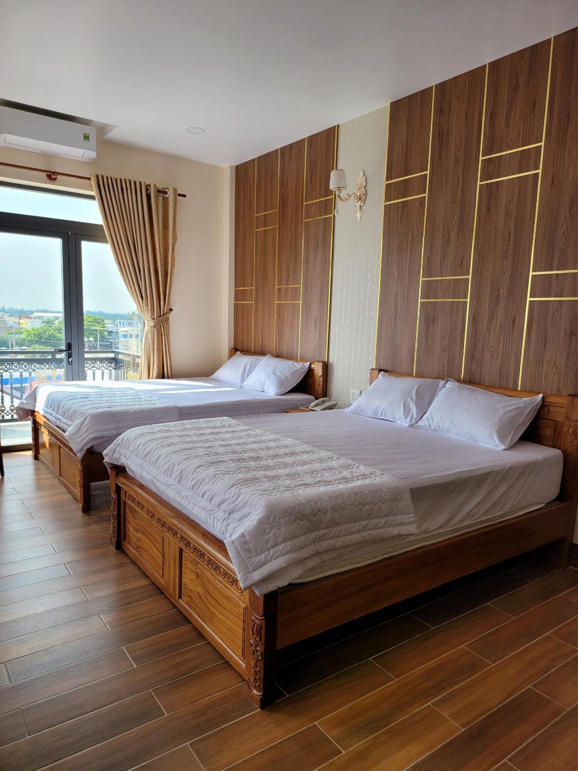 Deluxe Triple Room - Photo 1