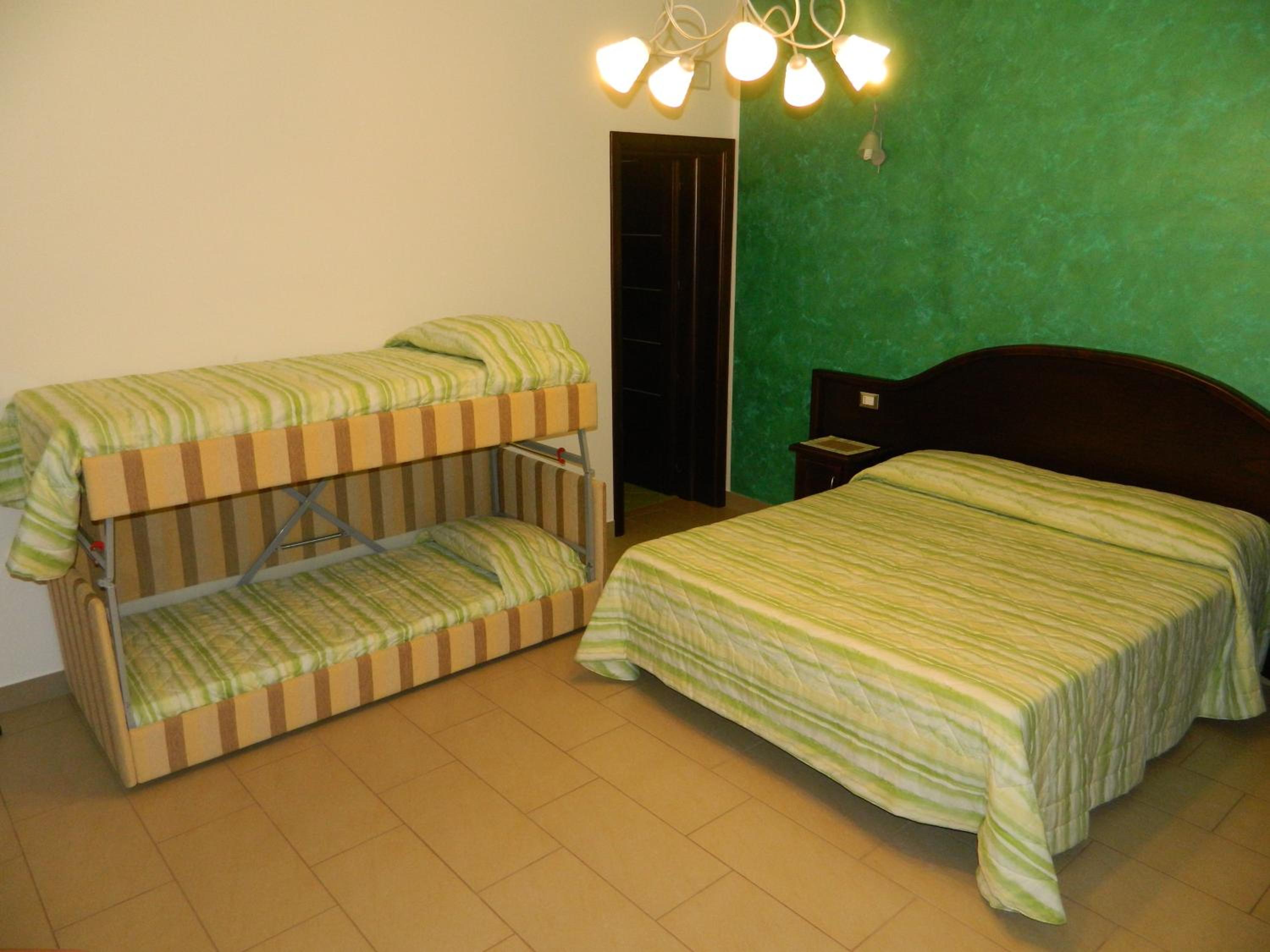 Quadruple Room with Balcony photo 3