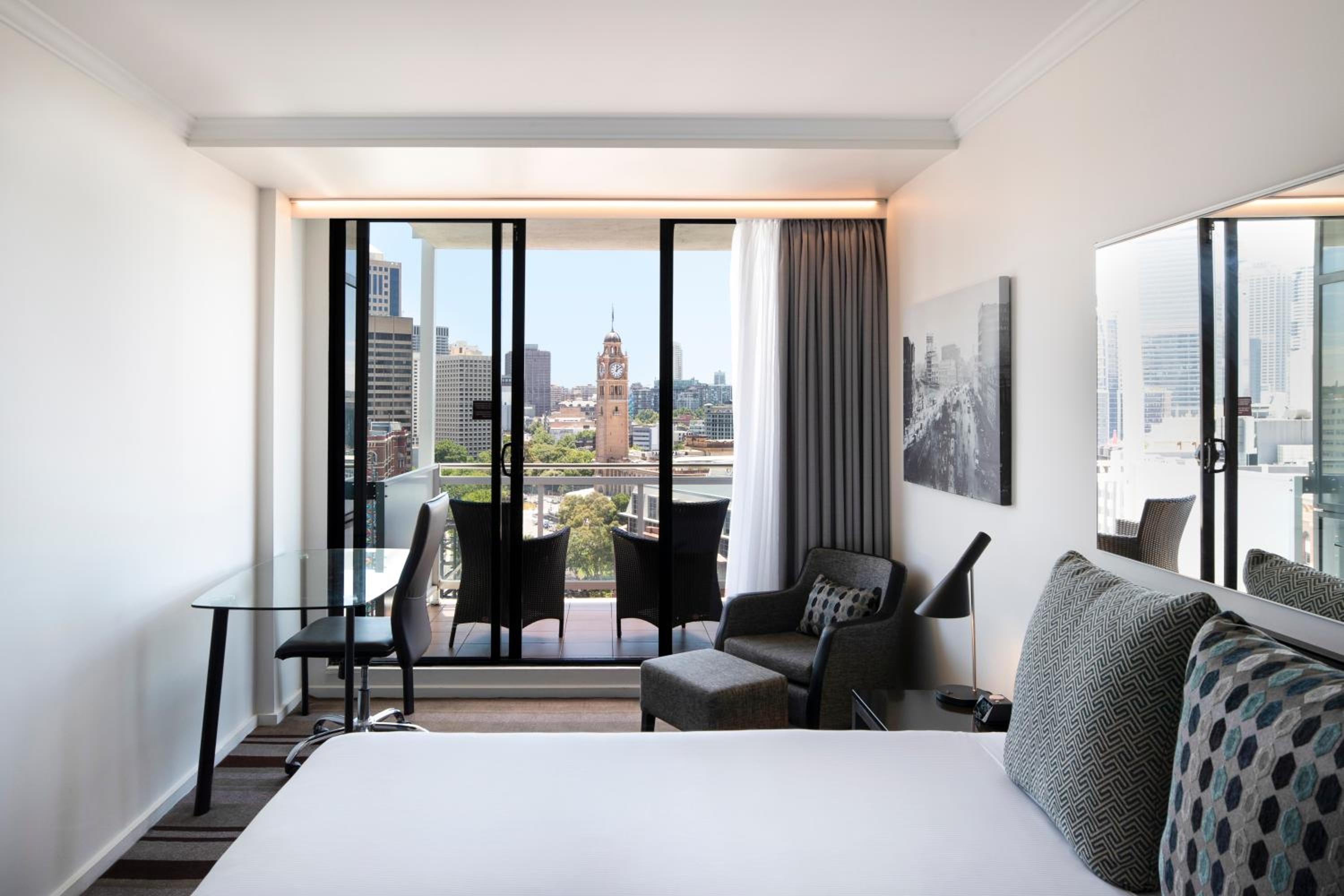 Queen Room with Balcony and City View