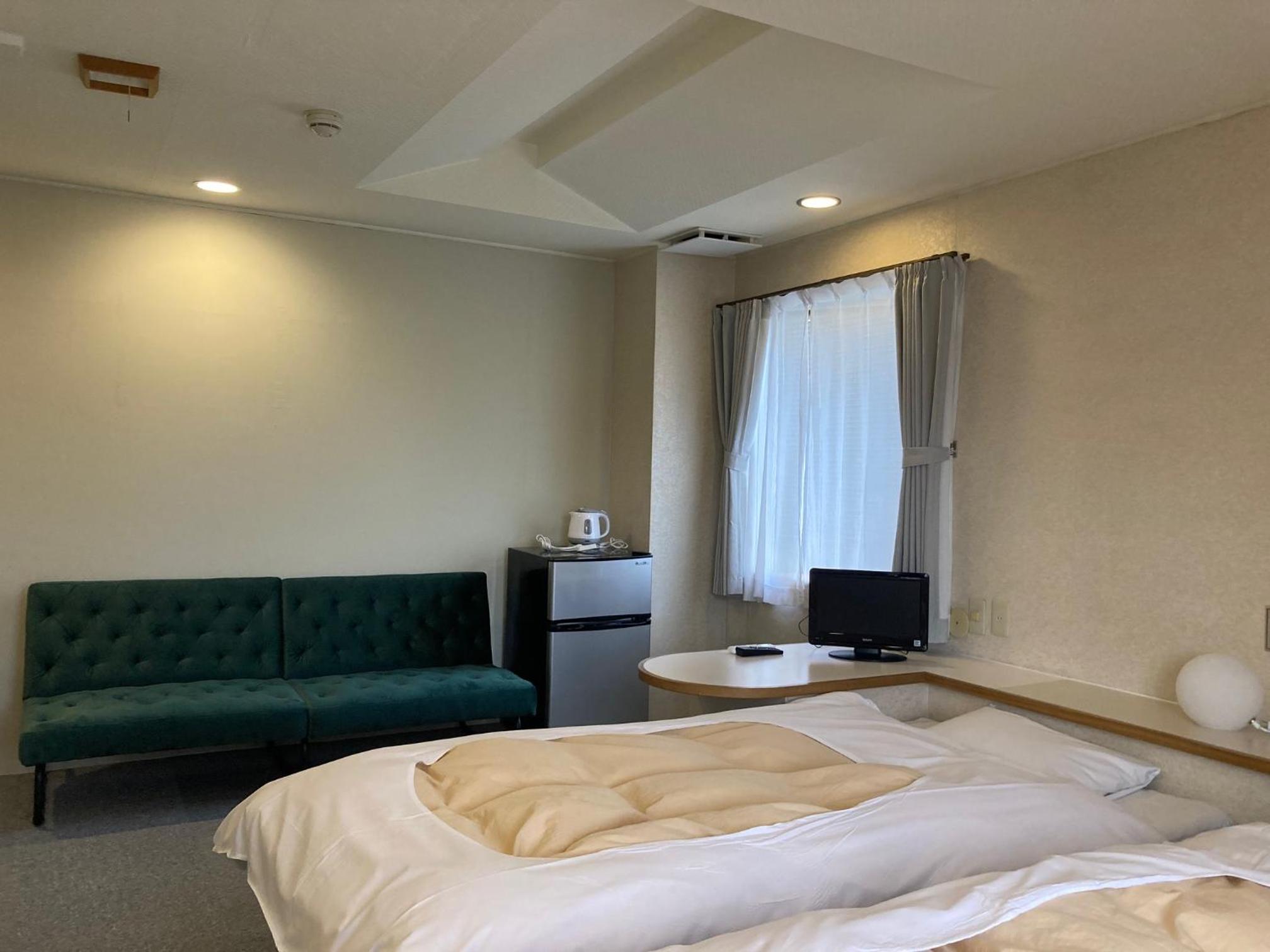Twin Room - Photo 1
