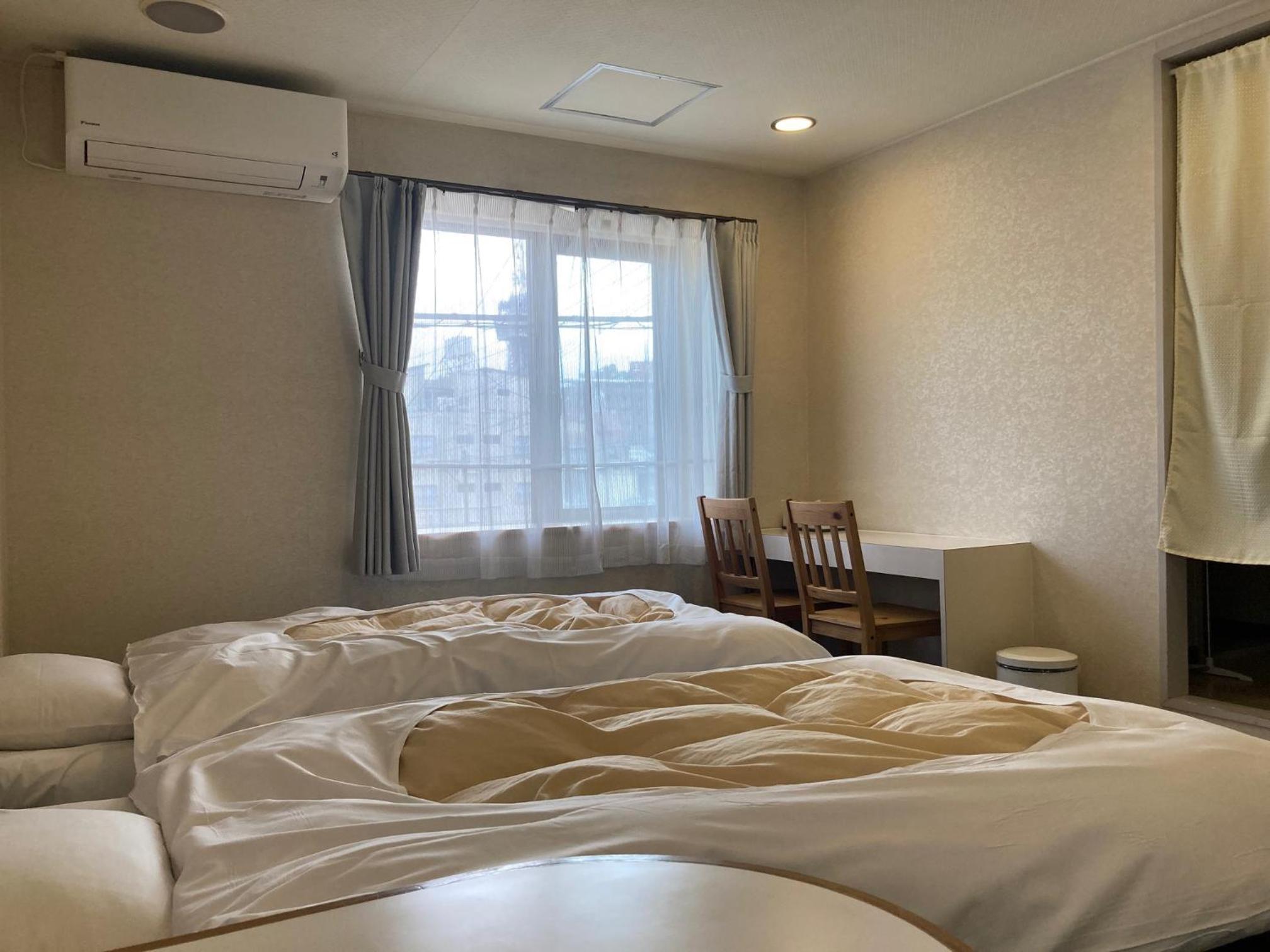Twin Room - Photo 2