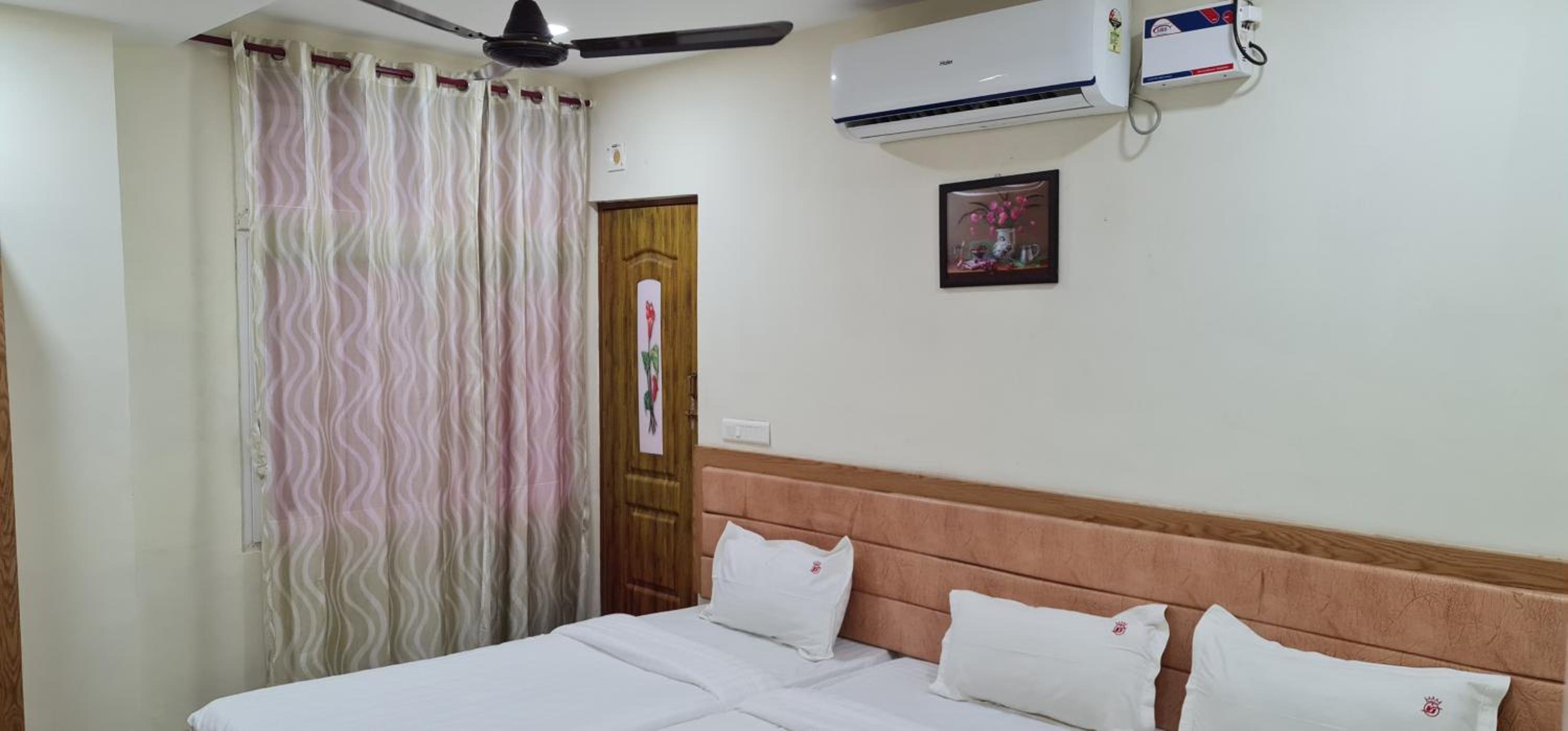 Deluxe Triple Room - Photo 11