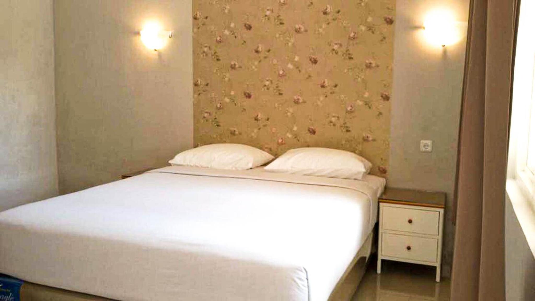 Deluxe Room - Photo 5