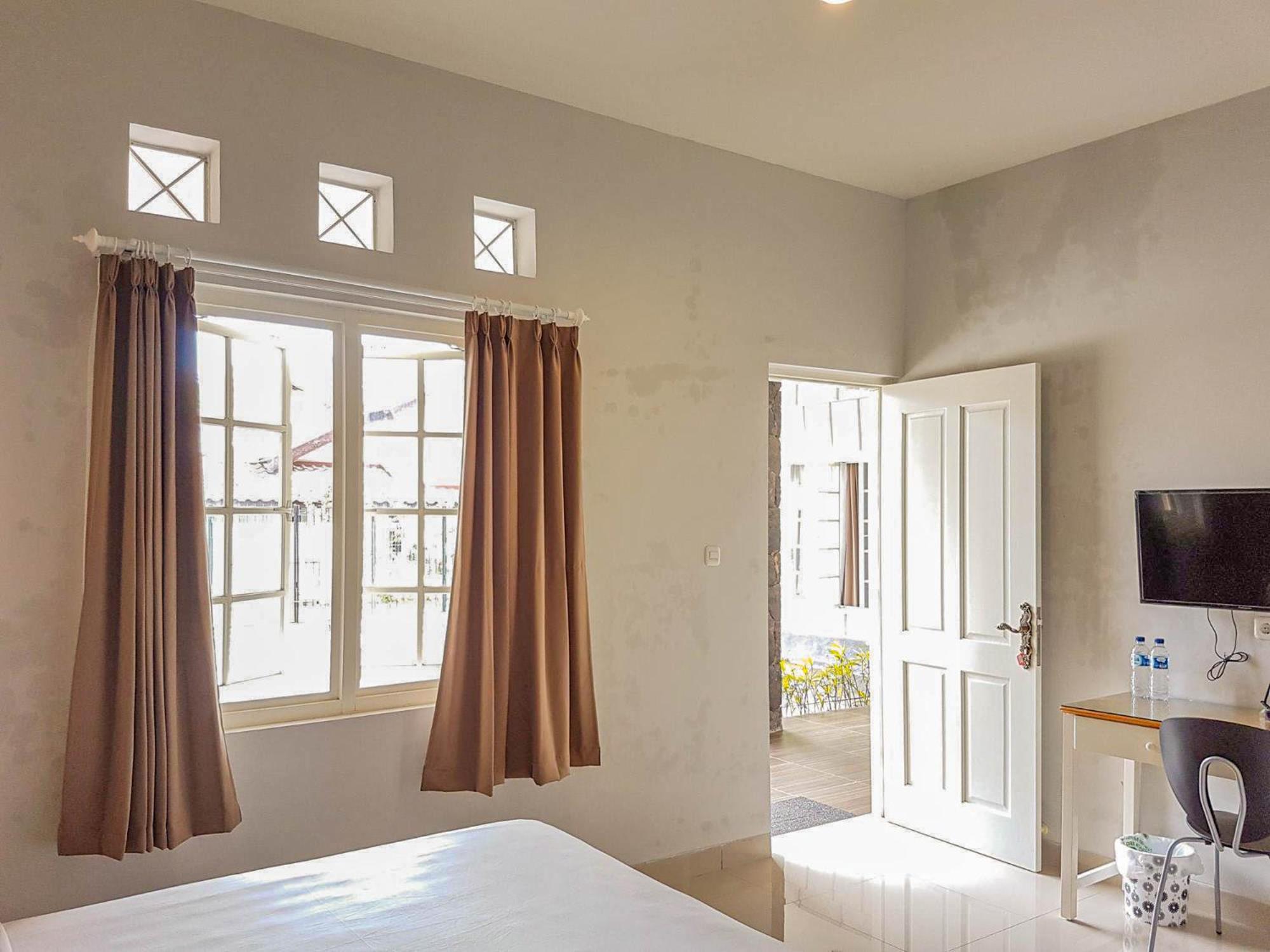 Deluxe Room - Photo 2