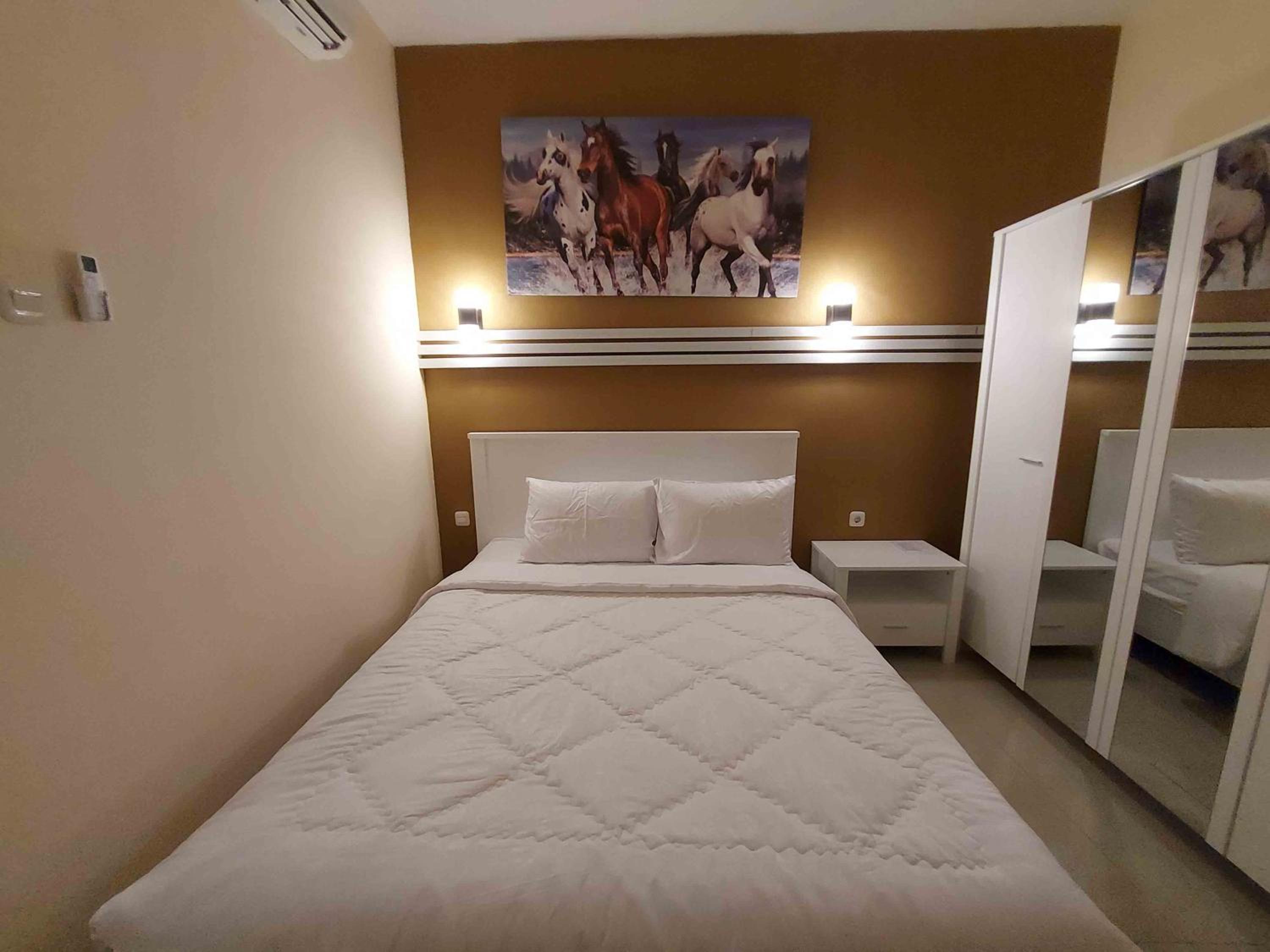 Deluxe Room - Photo 7