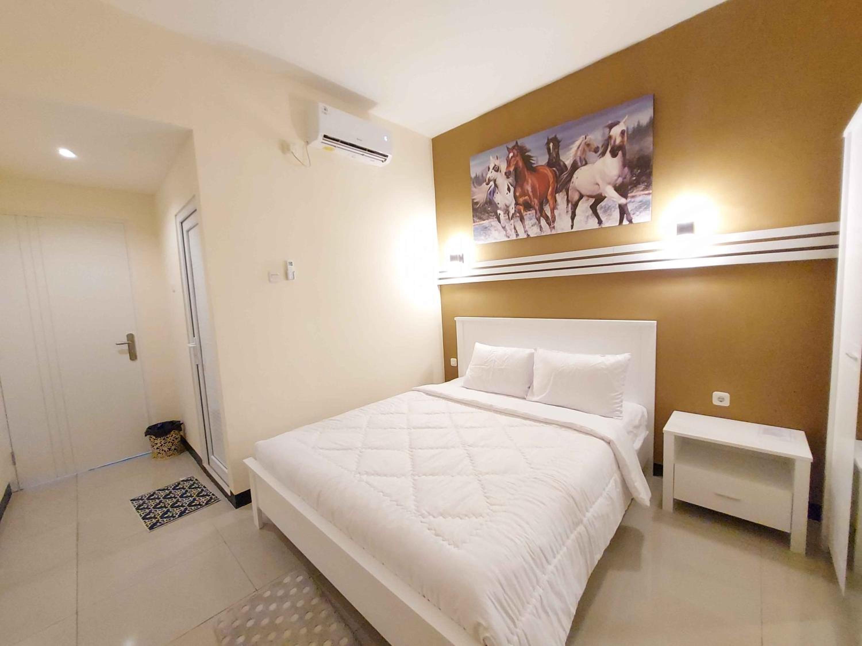 Deluxe Room - Photo 1