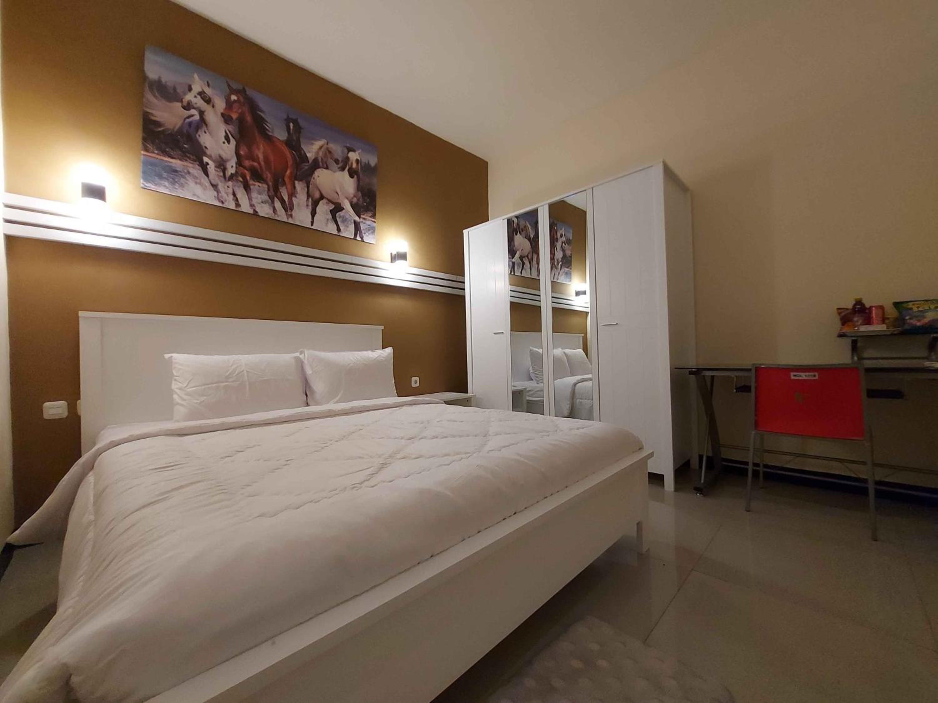 Deluxe Room - Photo 2