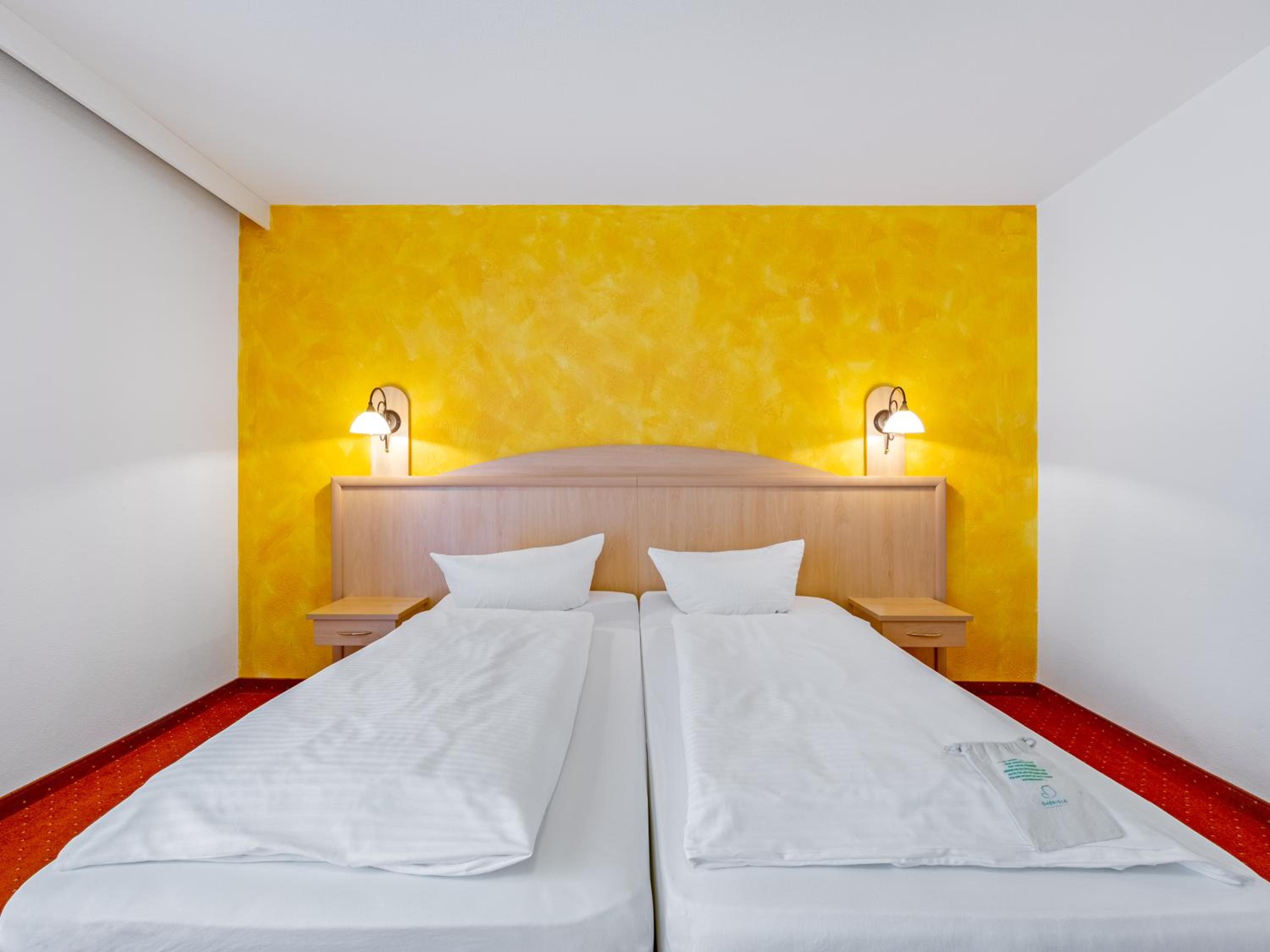 Quadruple Room with Balcony - Photo 9