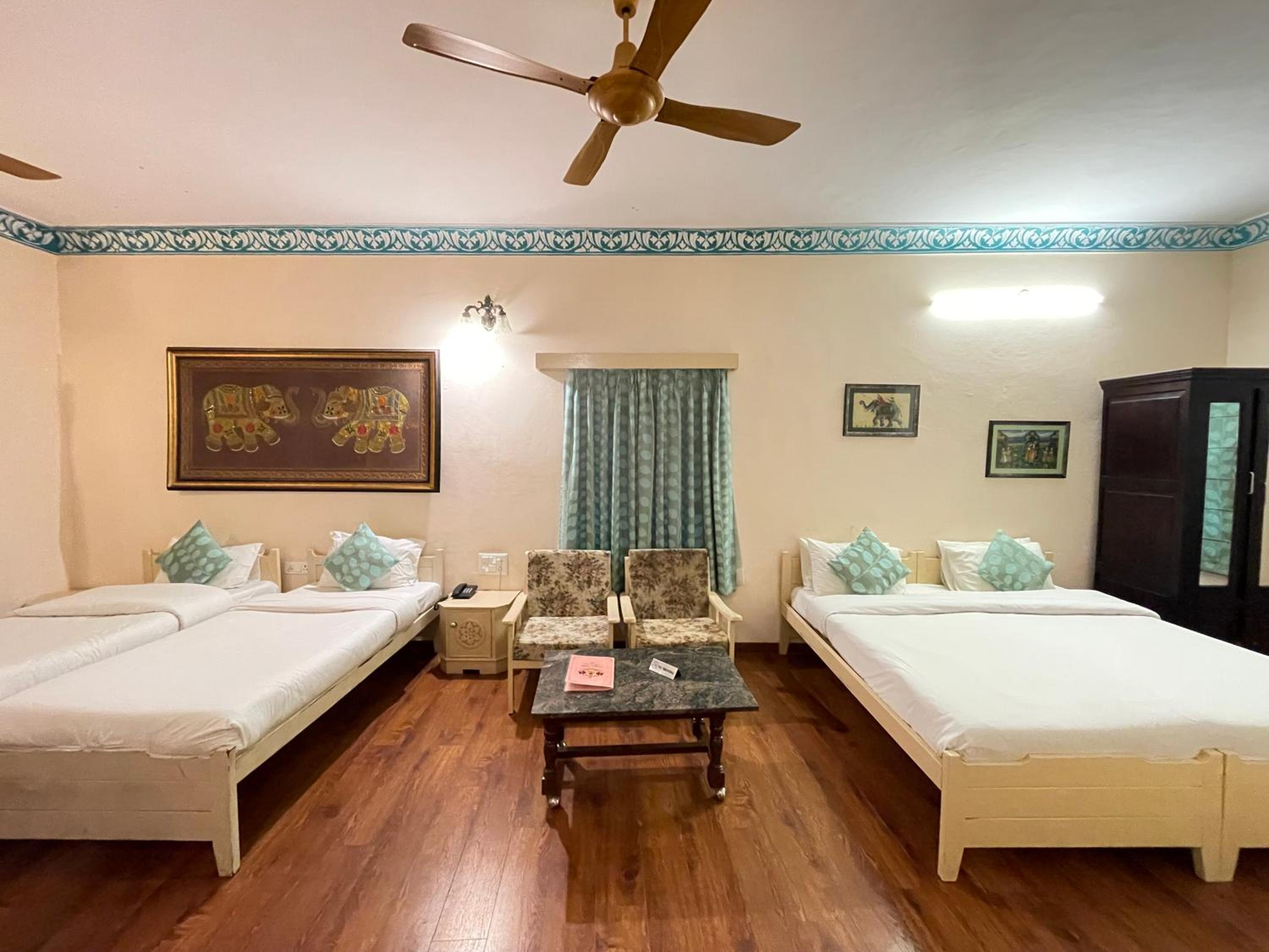 Classic Quadruple Room -  Includes free pickup from airport/ train station / bus station via tuk-tuk, & a dedicated travel desk to assist with local sightseeing tours, intercity travel arrangements & activities. - Photo 14
