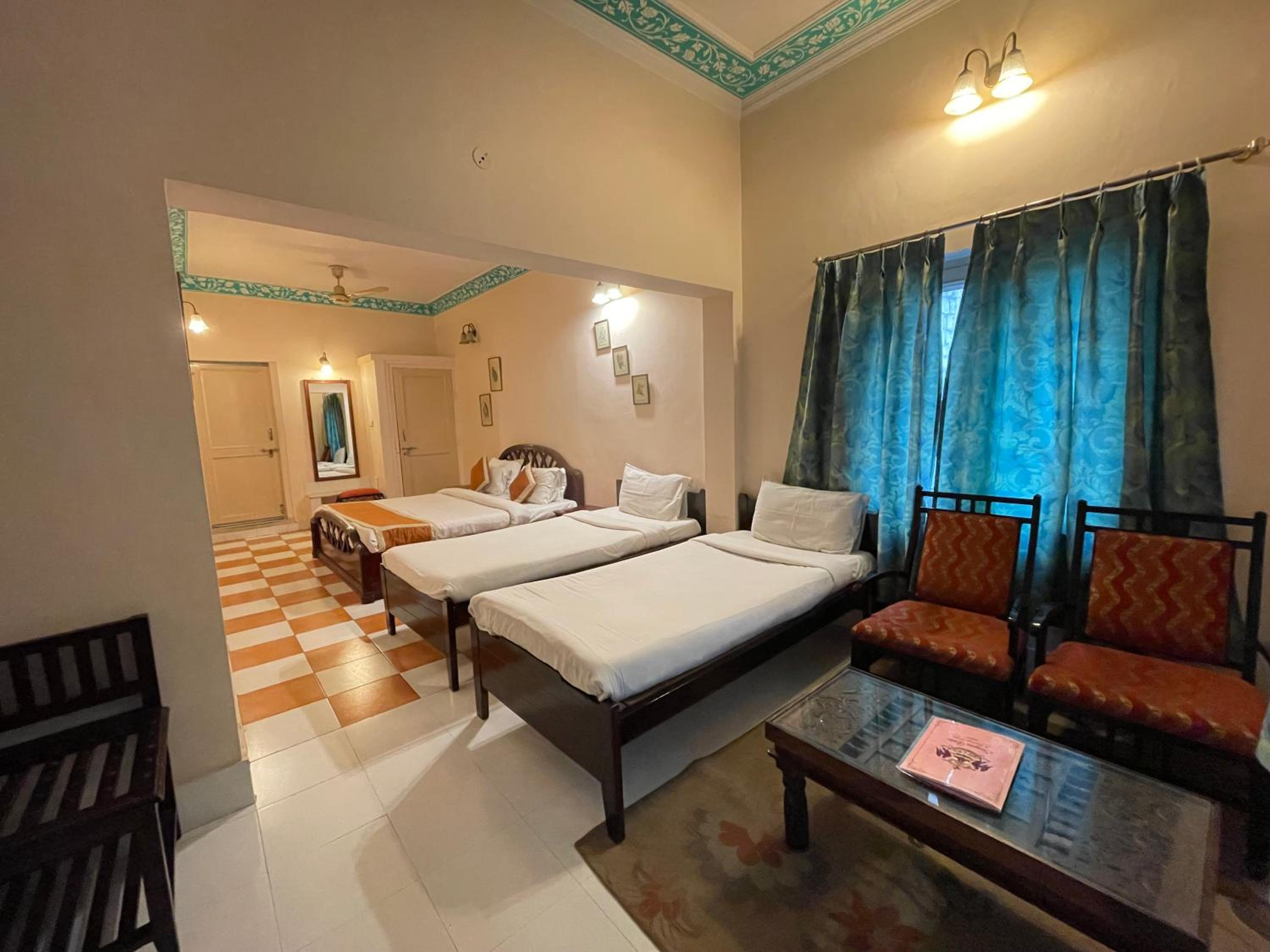 Classic Quadruple Room -  Includes free pickup from airport/ train station / bus station via tuk-tuk, & a dedicated travel desk to assist with local sightseeing tours, intercity travel arrangements & activities. - Photo 17