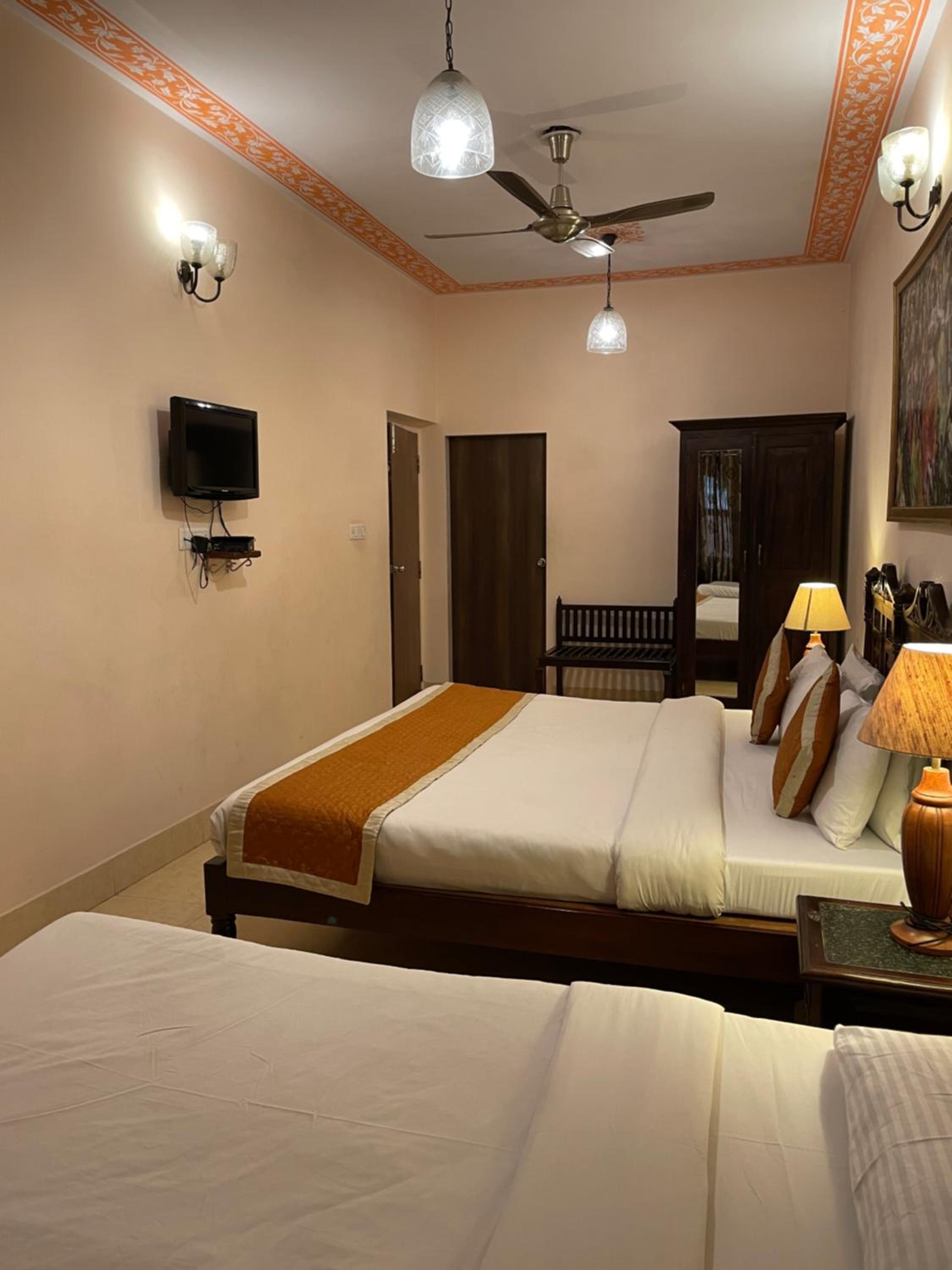 Deluxe Triple Room - Includes free pickup from airport/ train station / bus station via tuk-tuk, & a dedicated travel desk to assist with local sightseeing tours, intercity travel arrangements & activities. - Photo 9