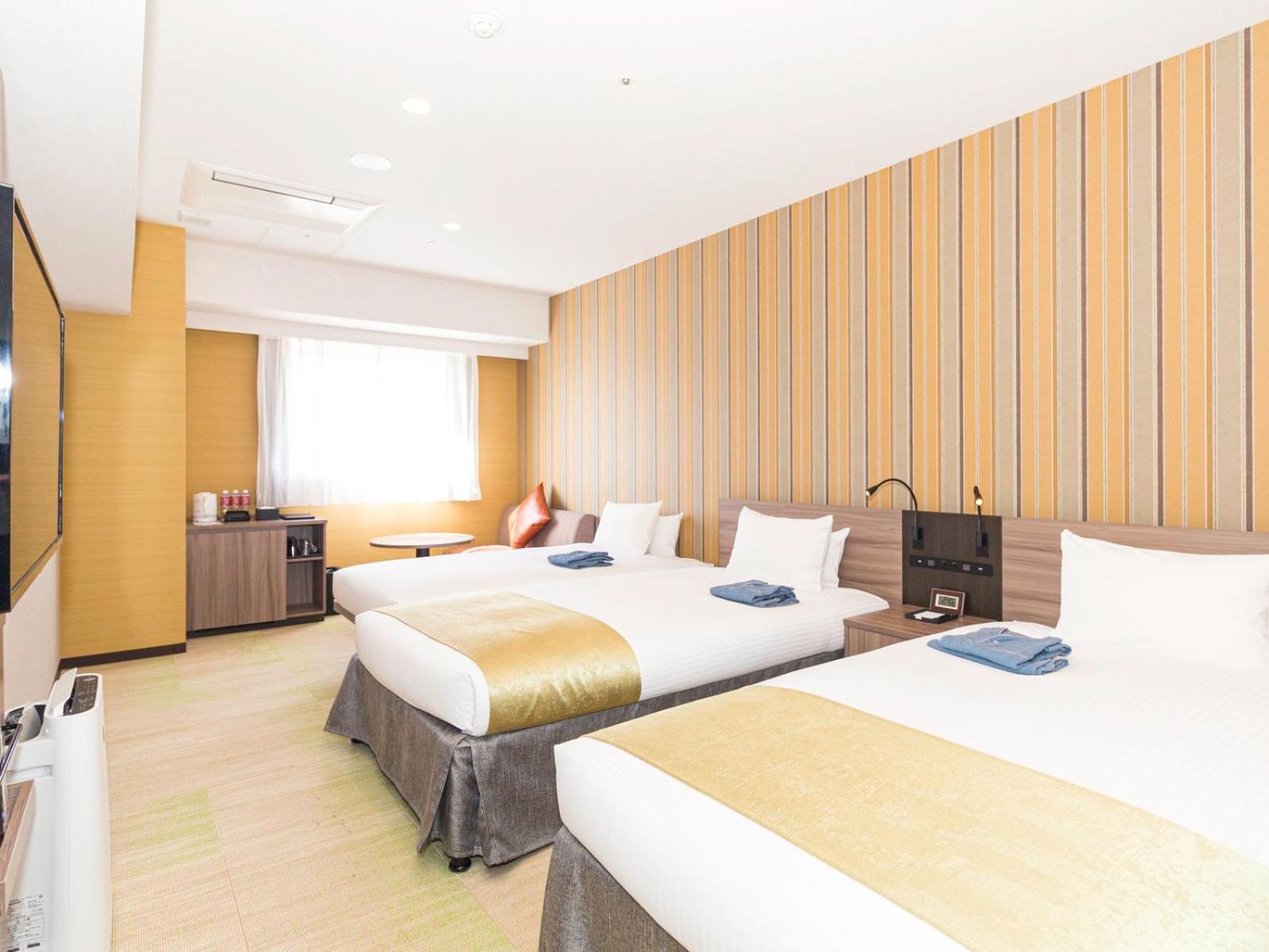 Deluxe Twin Room for 3 adult - Photo 1