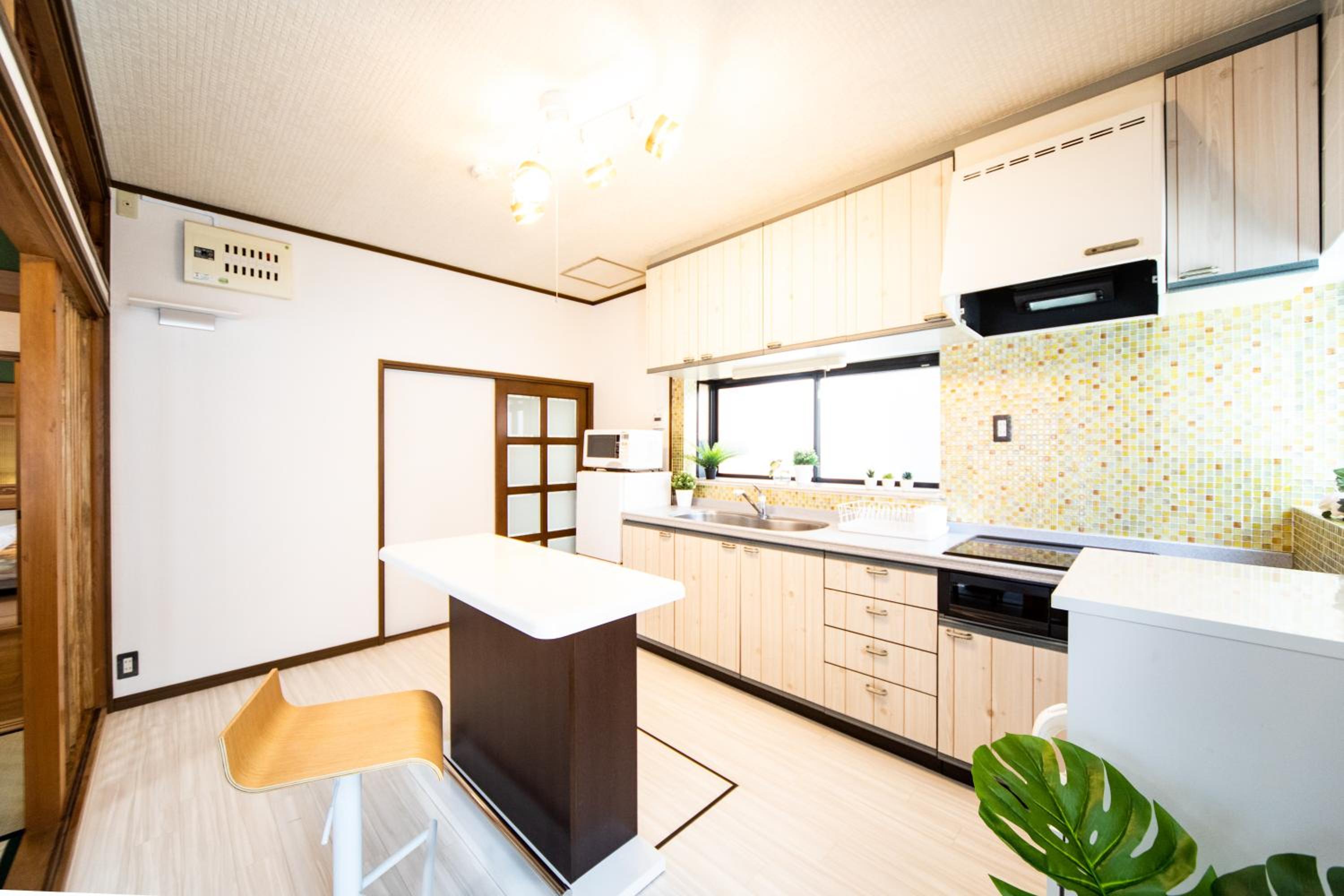 Three-Bedroom House - Photo 5