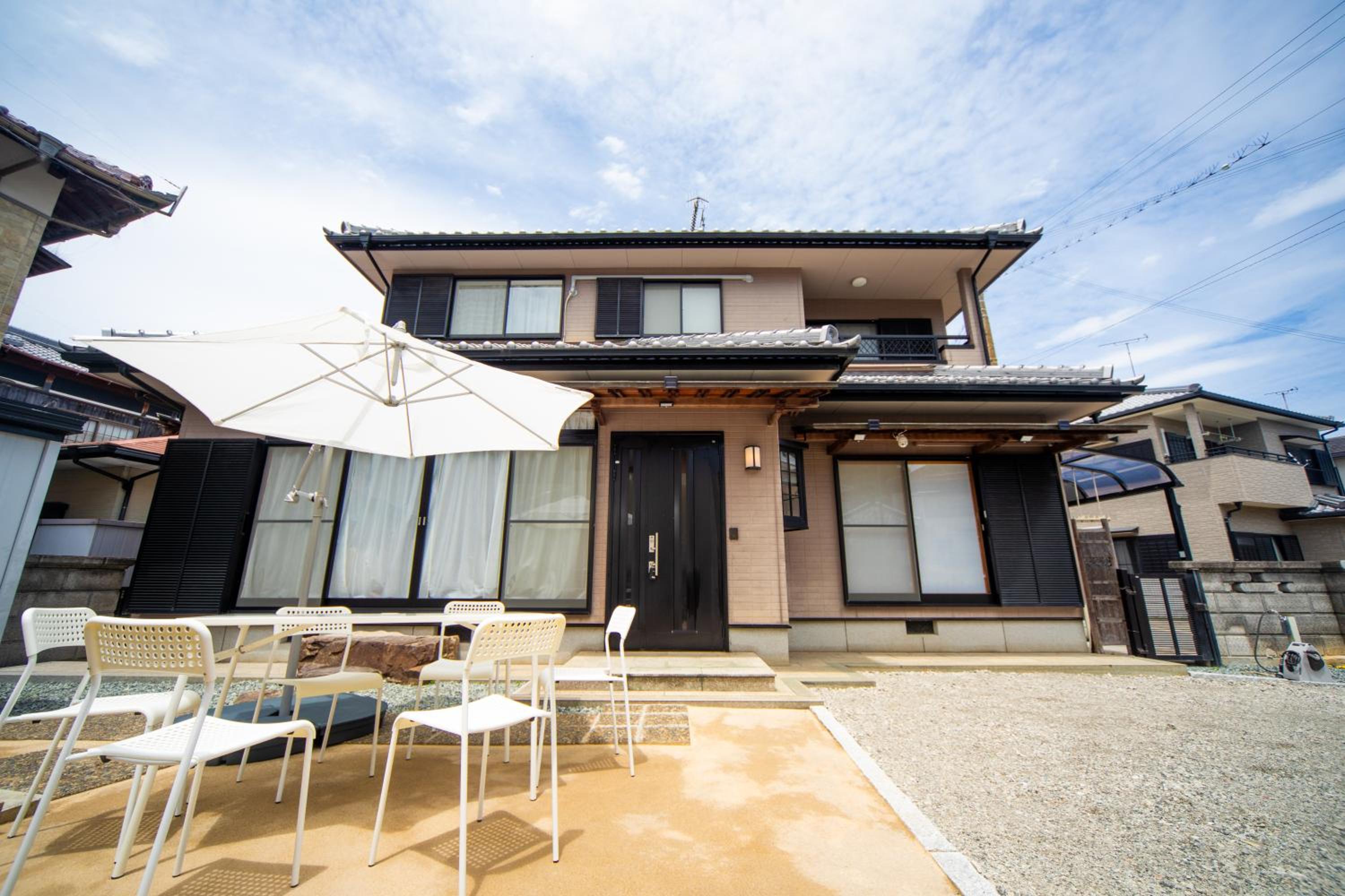Three-Bedroom House - Photo 41