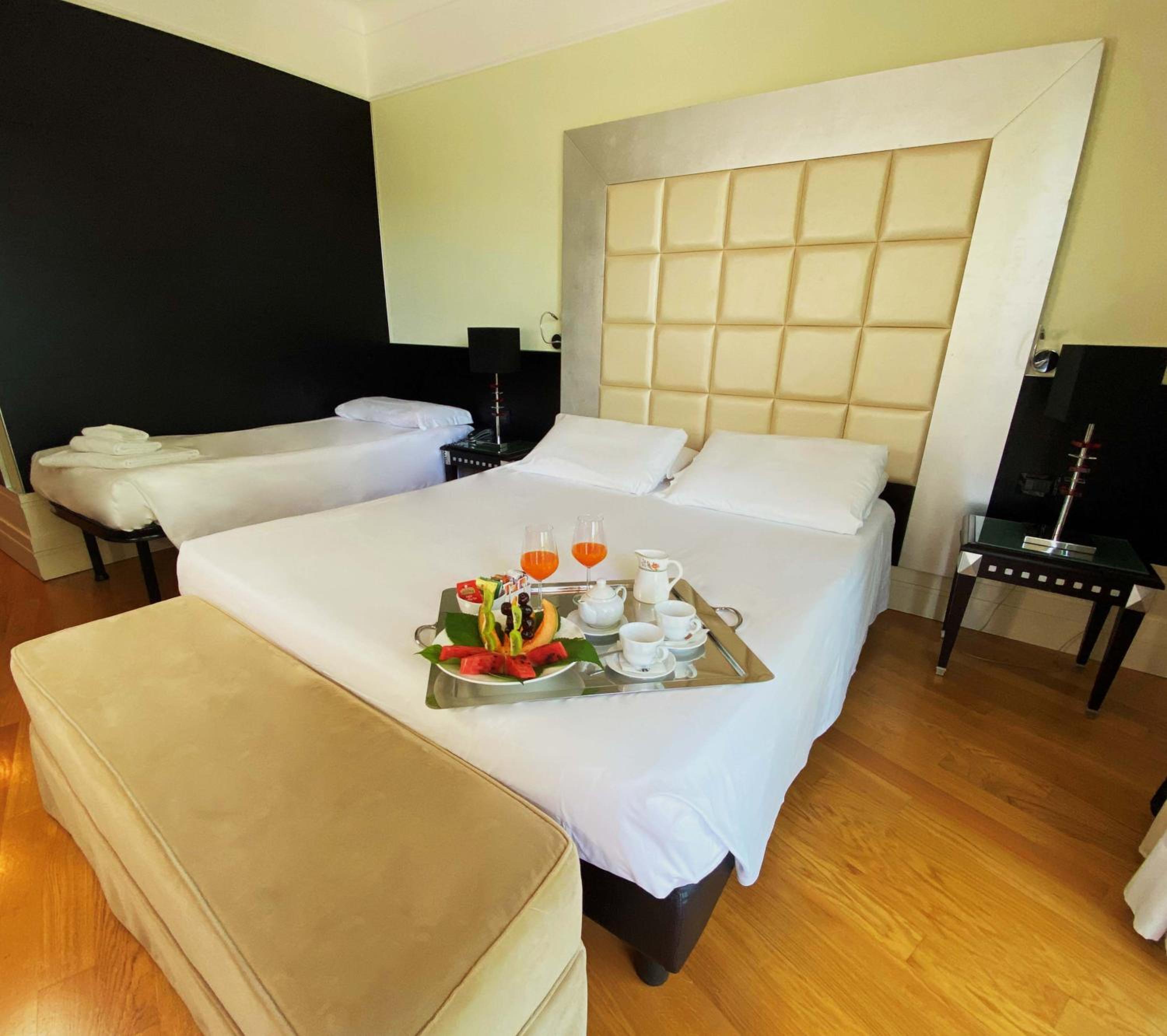 Deluxe Triple Room - Photo 1