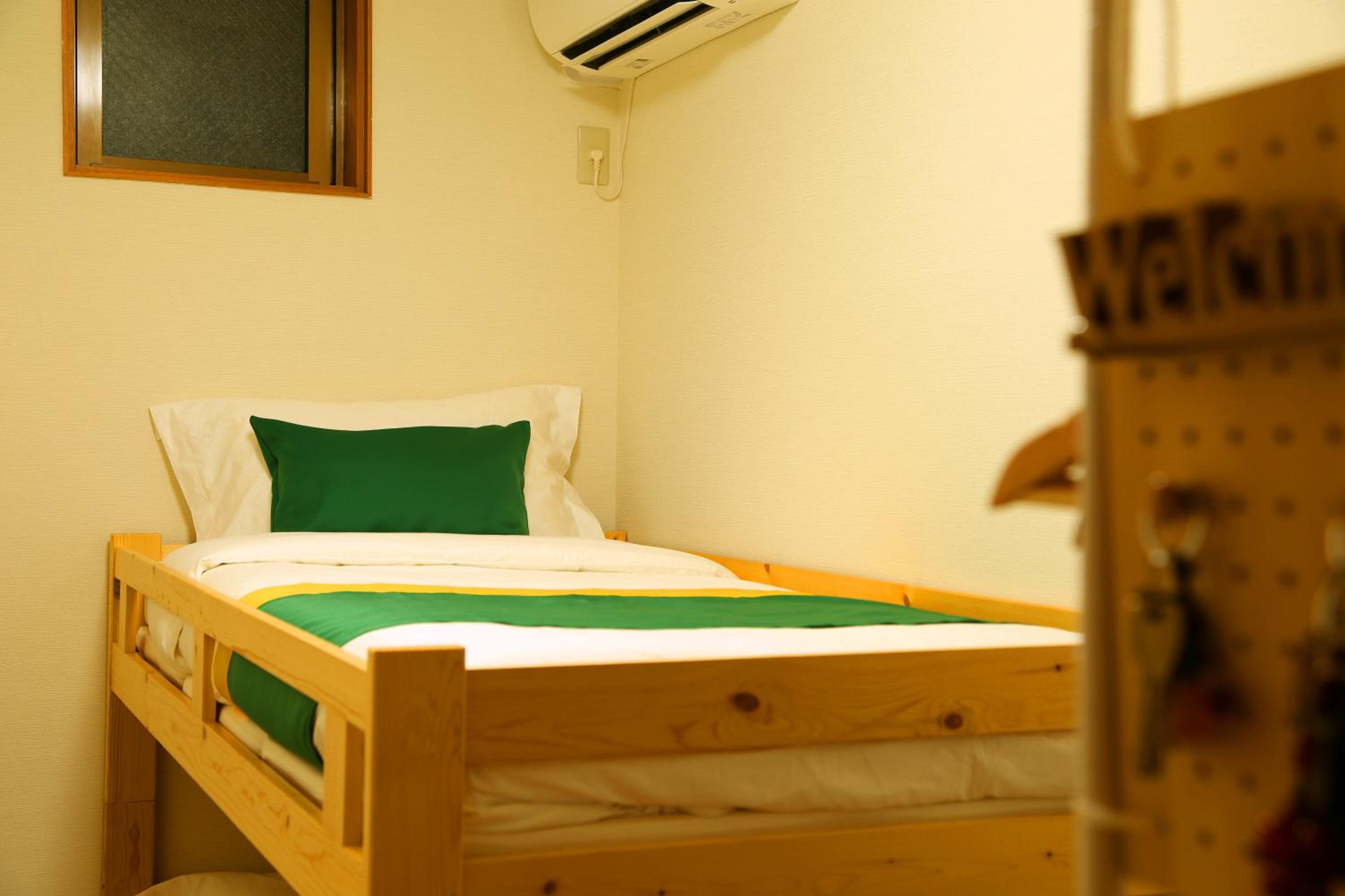 Mixed Dormitory Room with Shared Shower and Toilet photo 2
