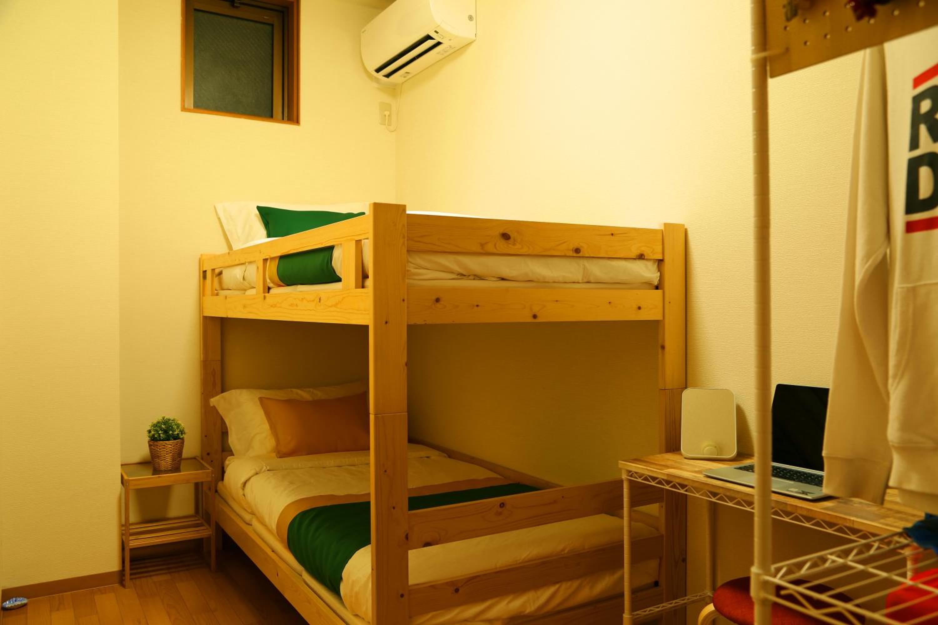 Mixed Dormitory Room with Shared Shower and Toilet photo 1