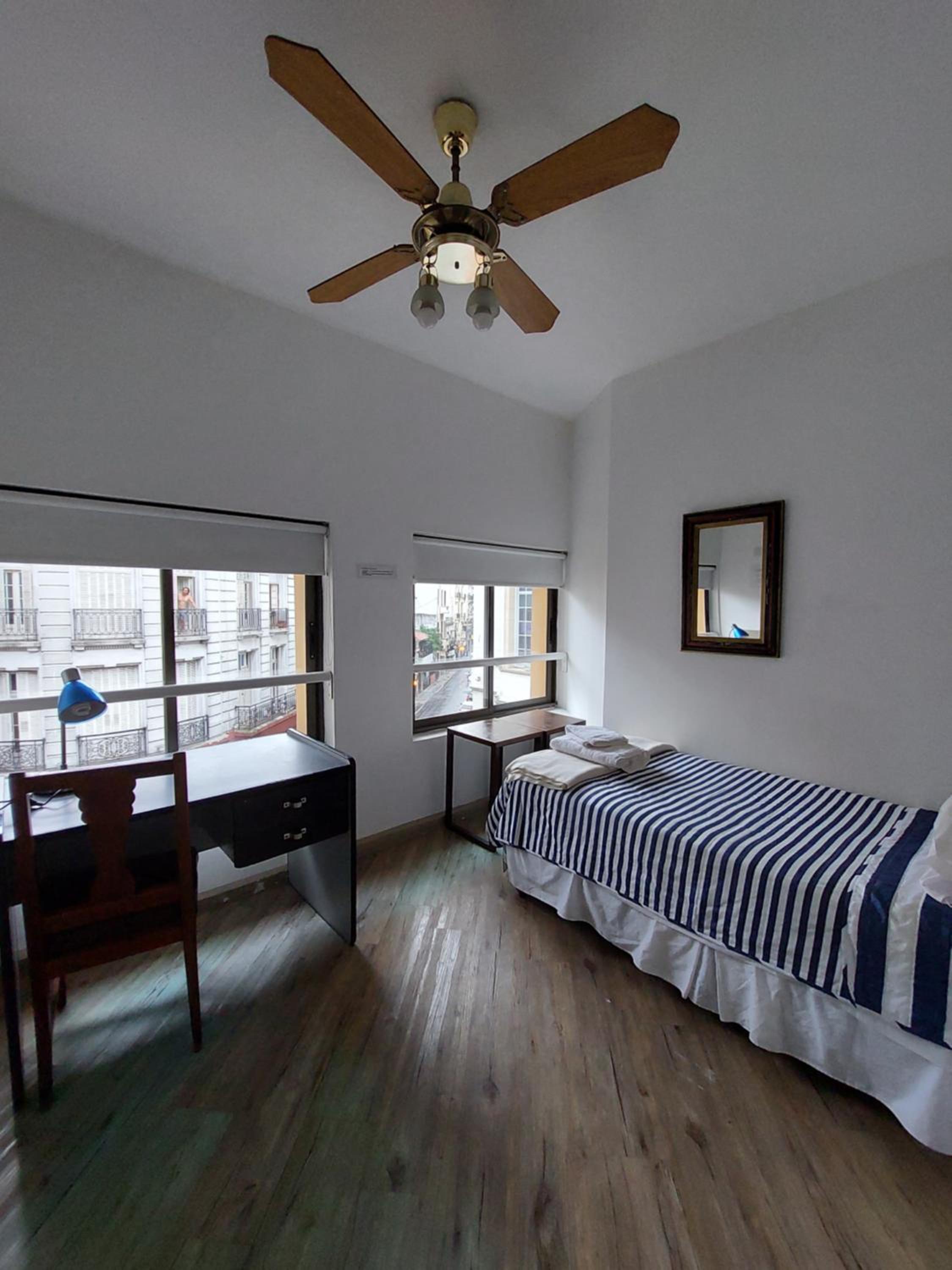 Single Bed in Dormitory Room