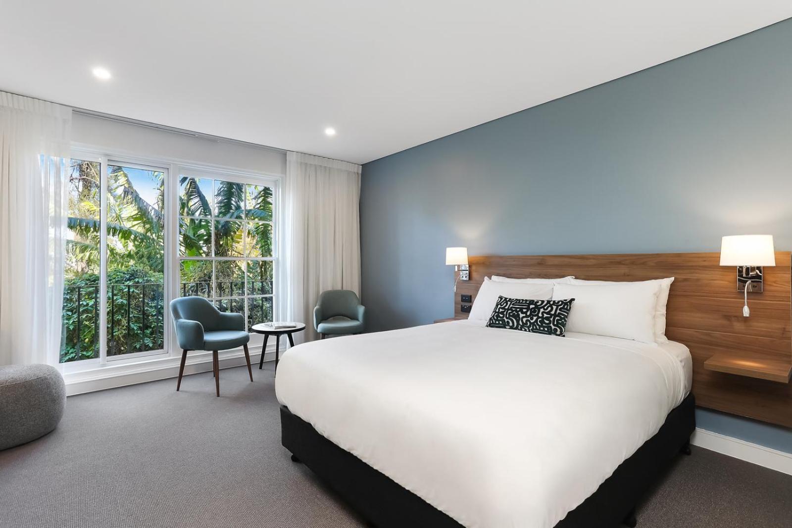 Deluxe Queen Room - Photo 10