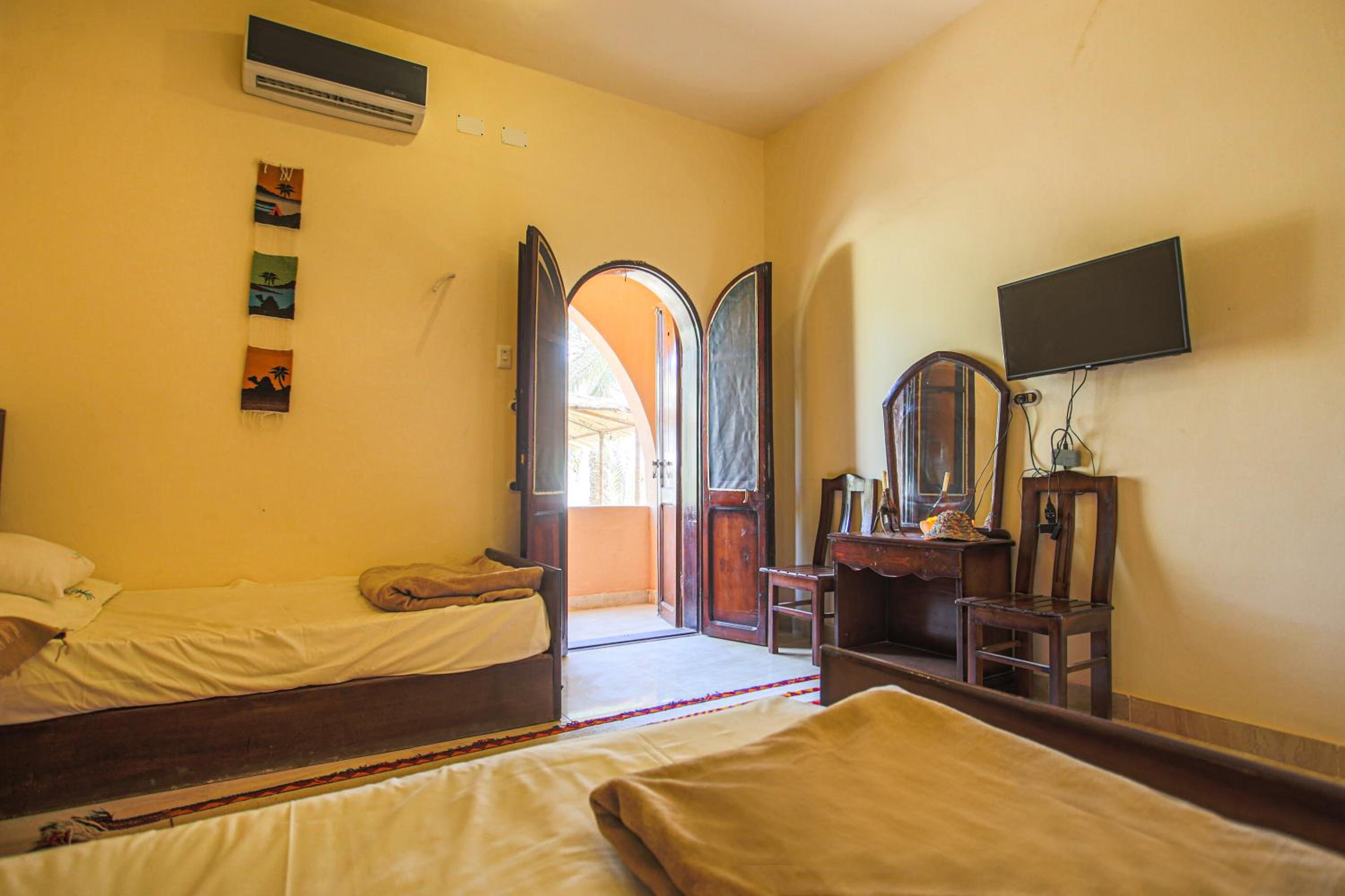 Deluxe Triple Room - Photo 9