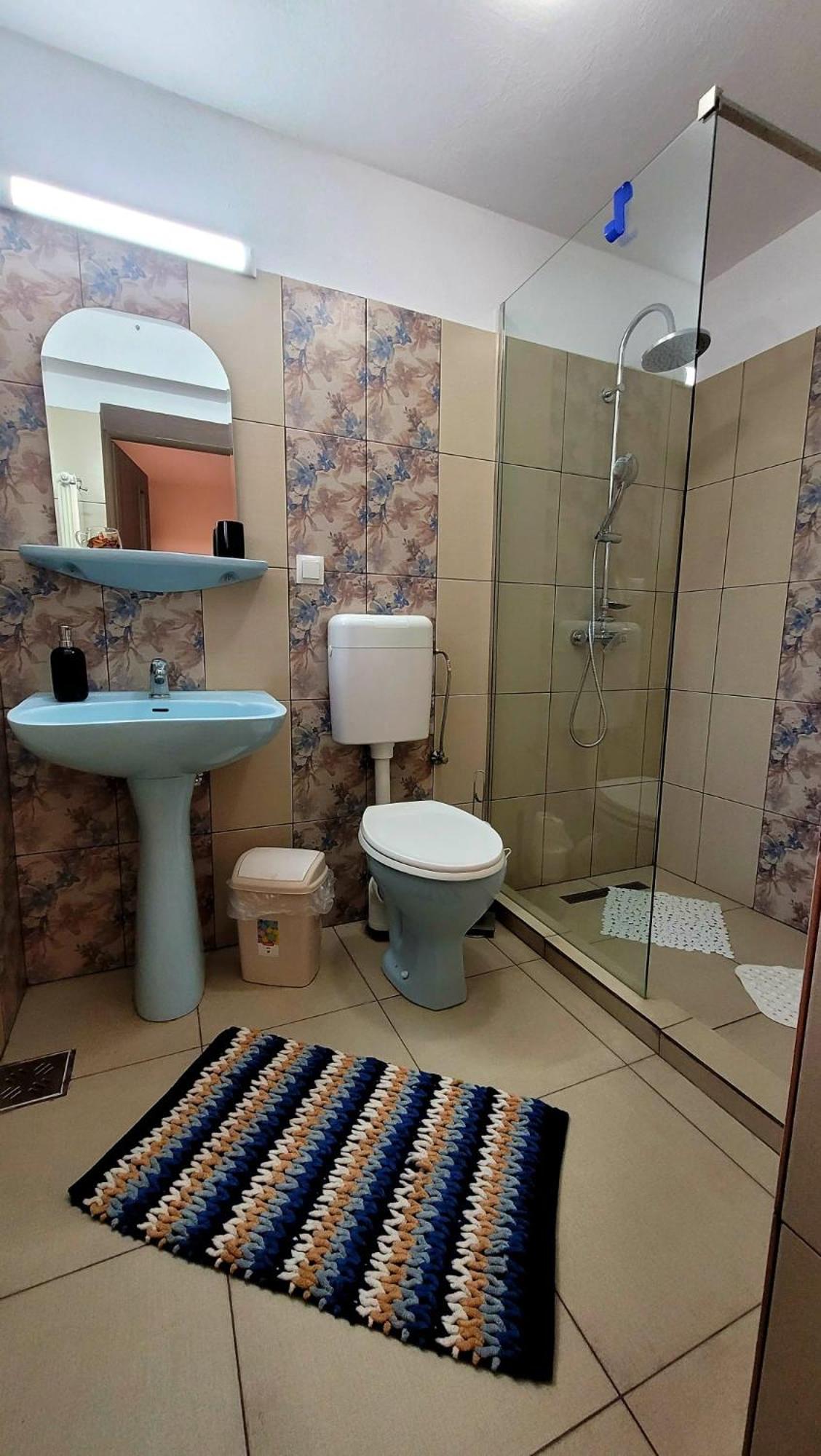Three-Bedroom House - Photo 18