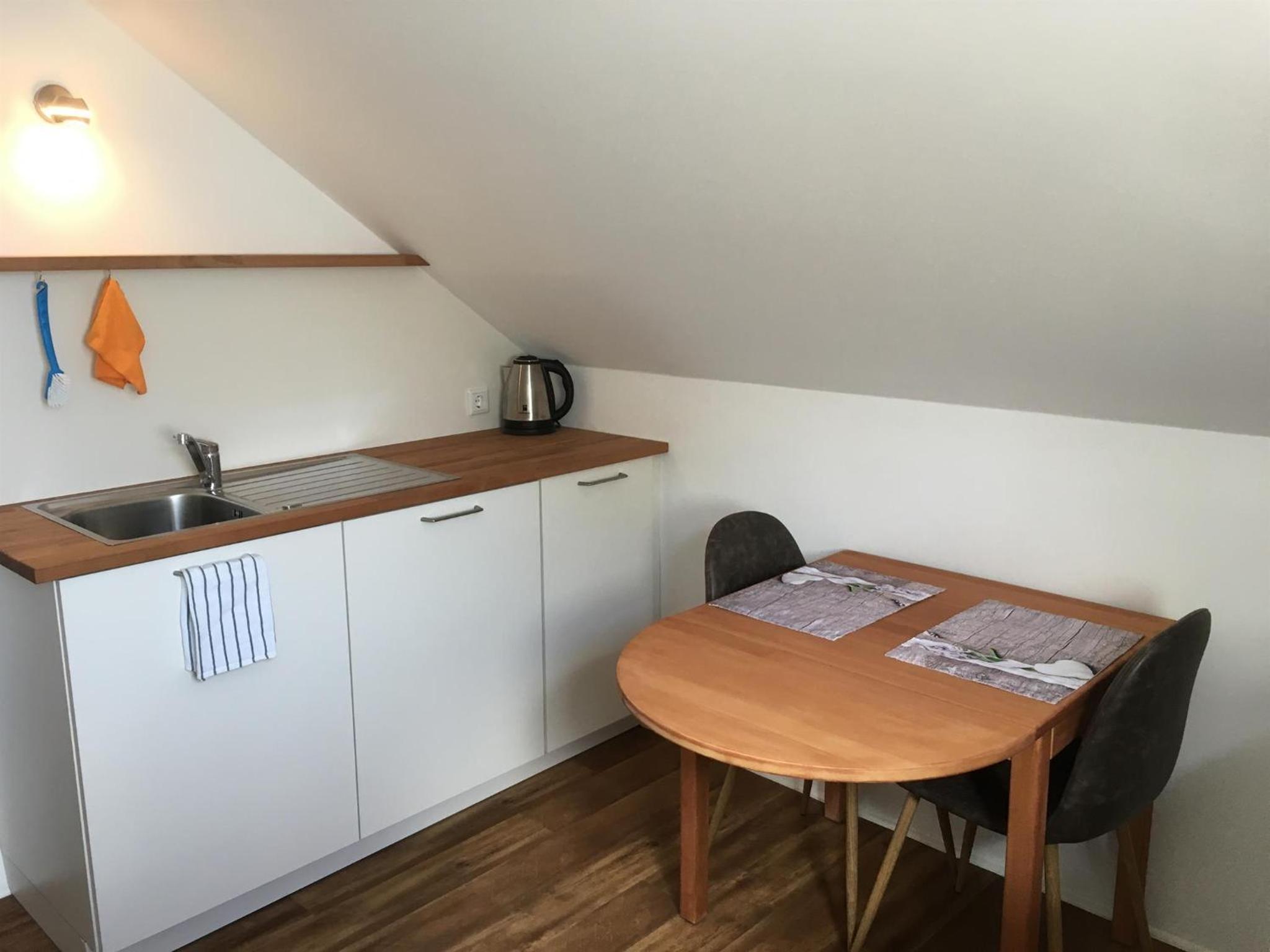 One-Bedroom Apartment with Shower photo 2