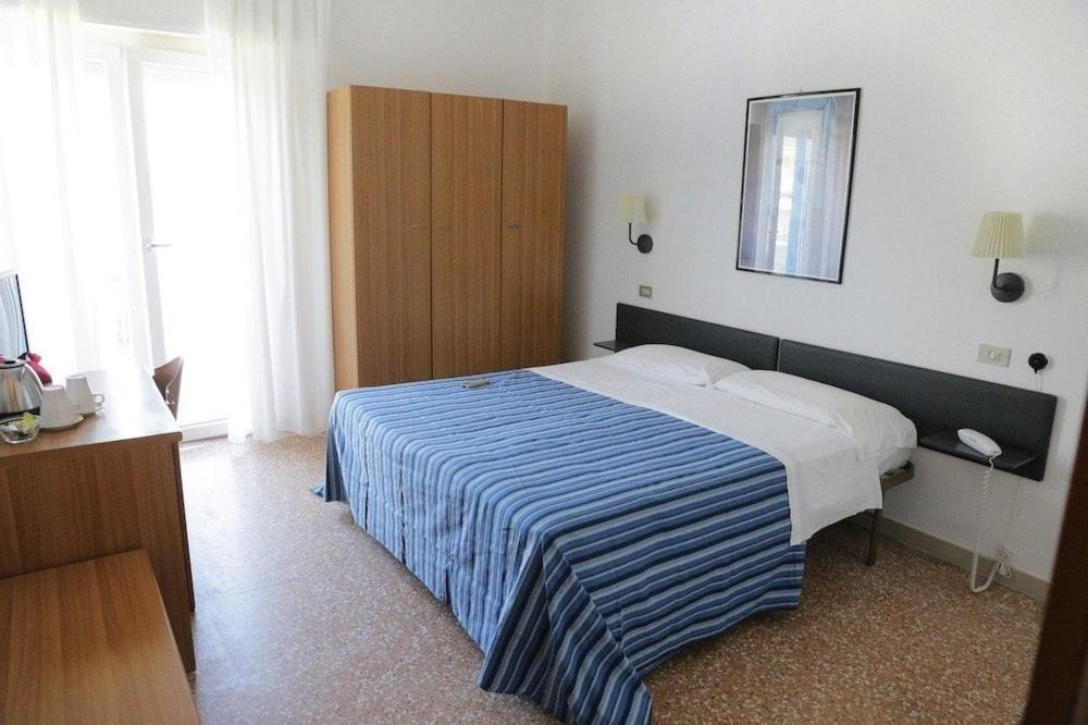 Quadruple Room with Side Sea View