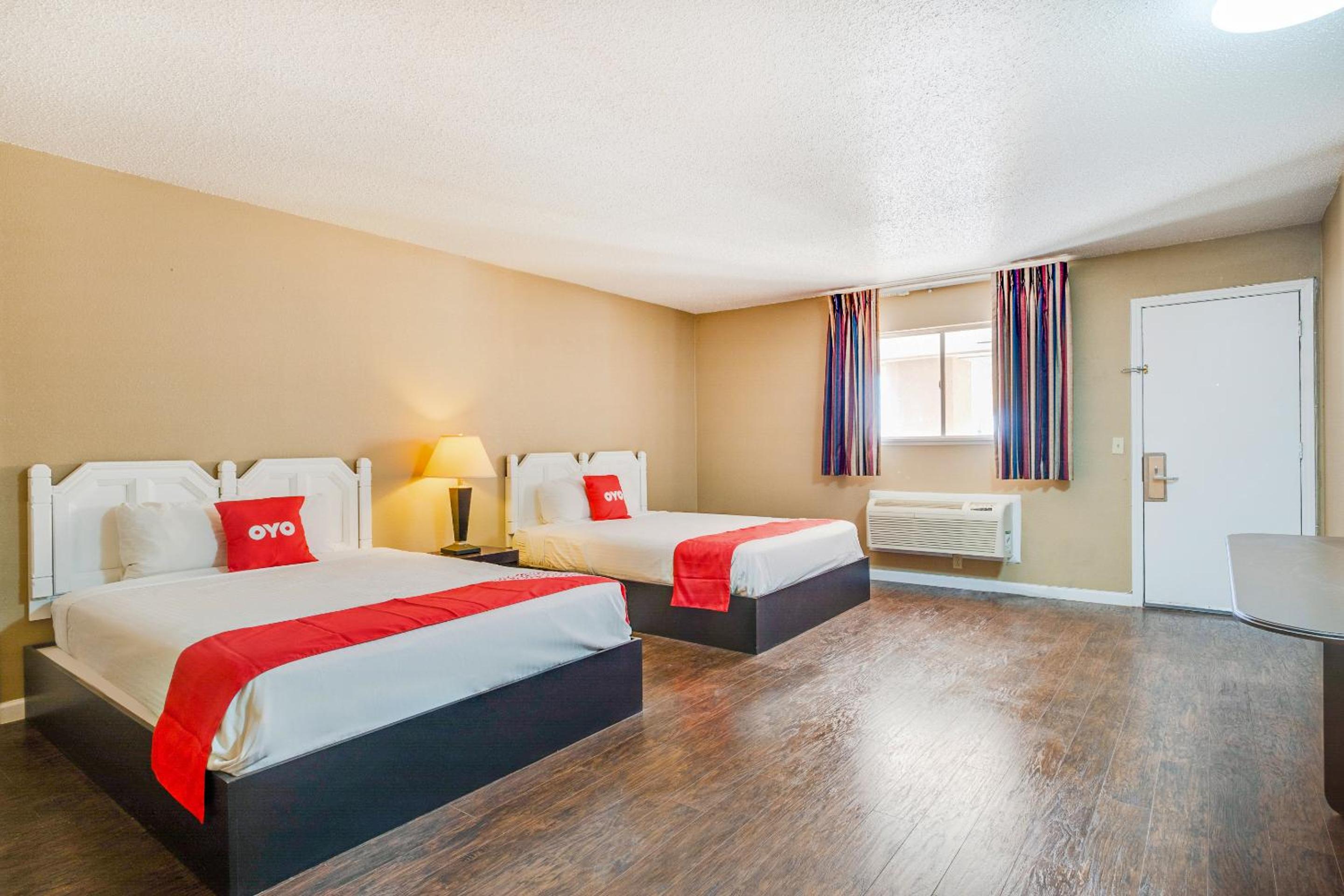 Queen Room with Two Queen Beds - Photo 1