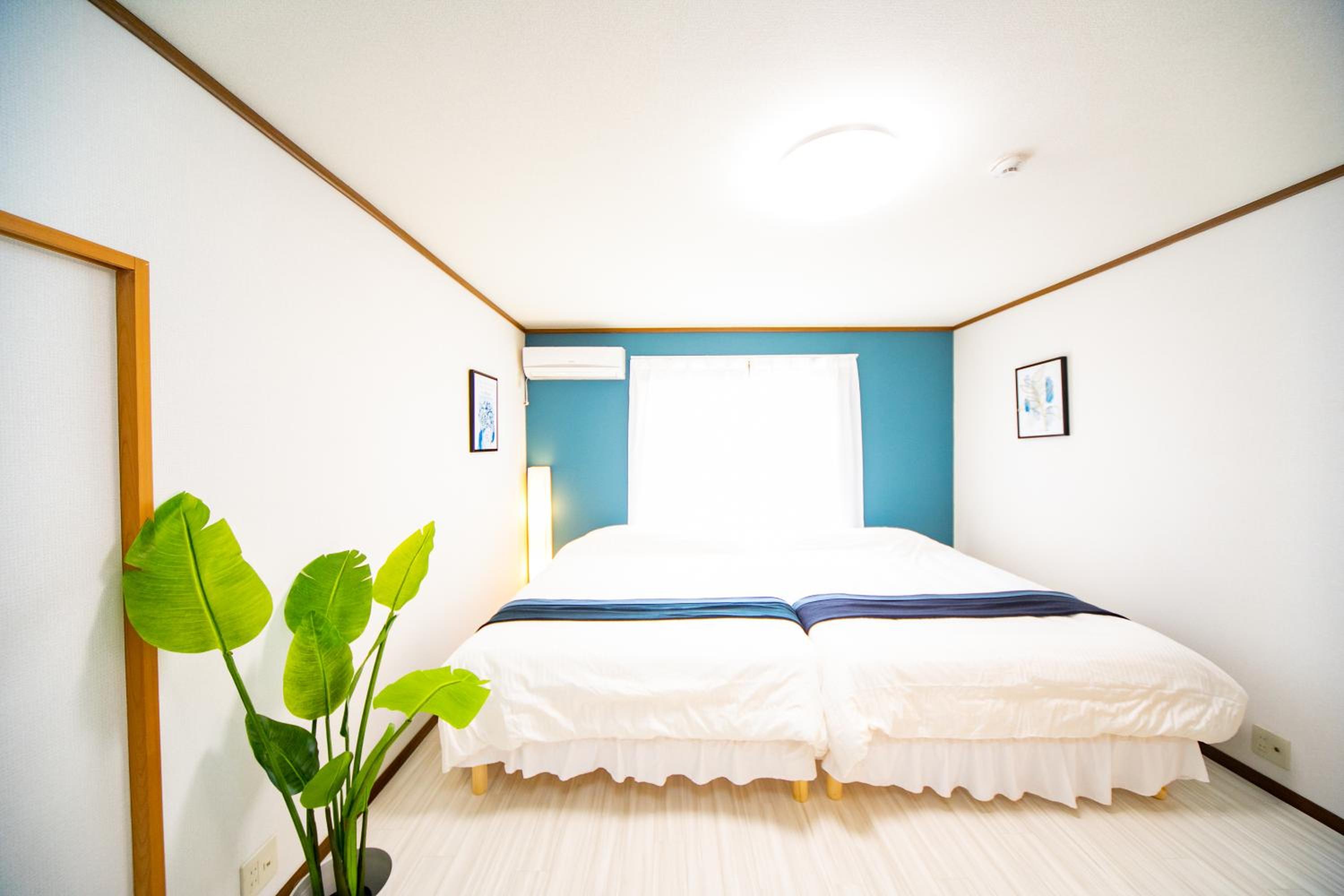 Three-Bedroom House - Photo 26
