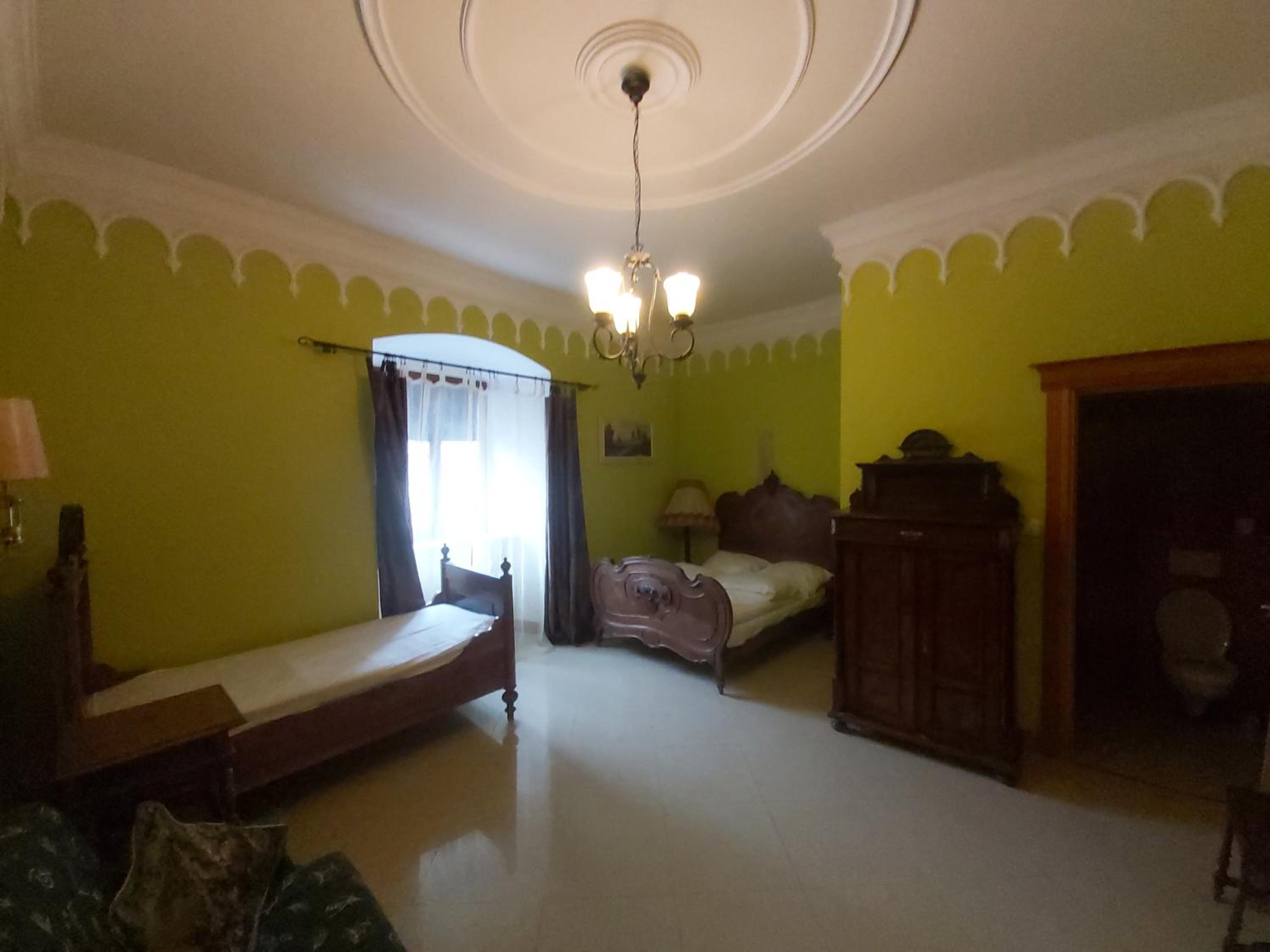 Quadruple Room with Private Bathroom