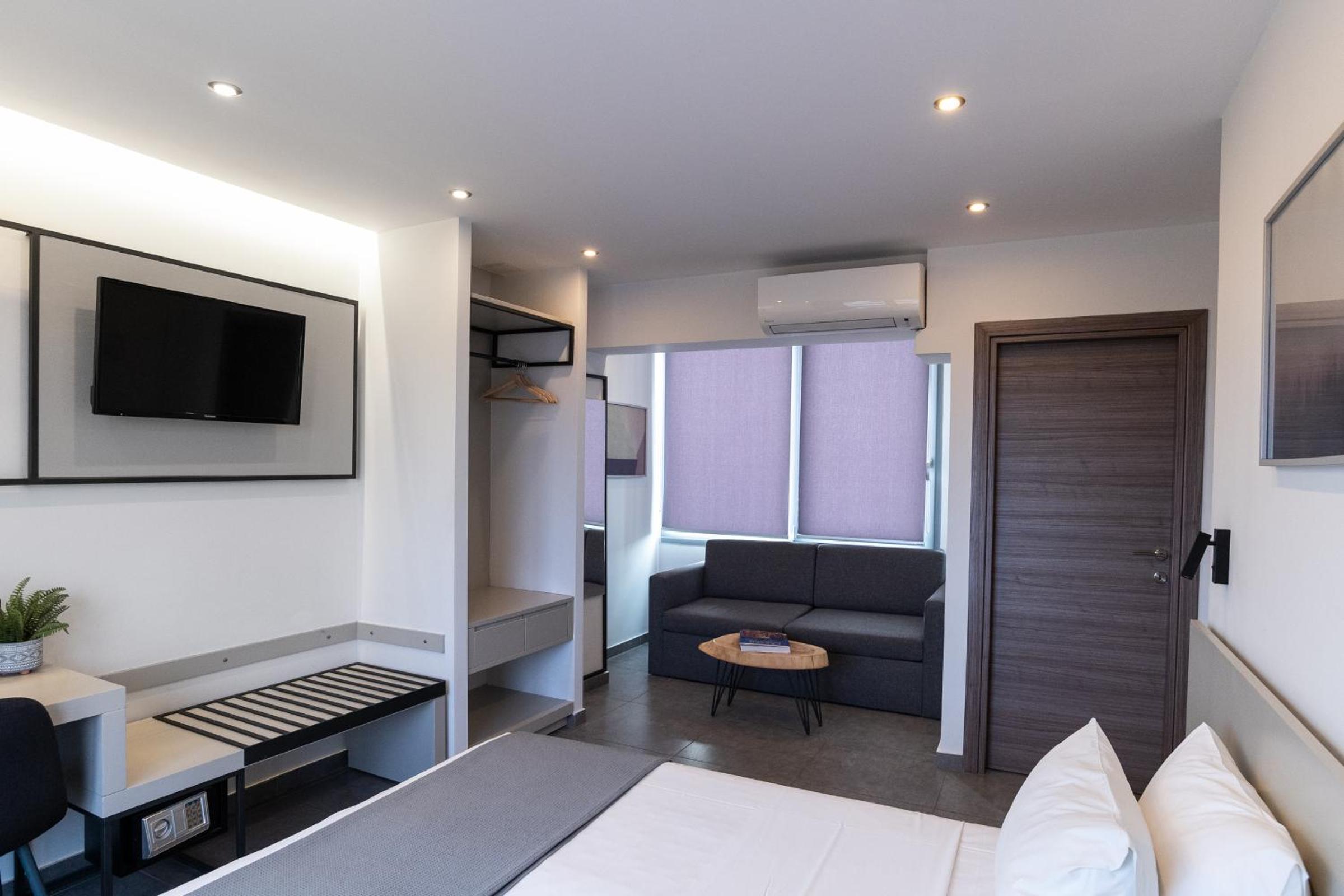 Deluxe Triple Room - Photo 9