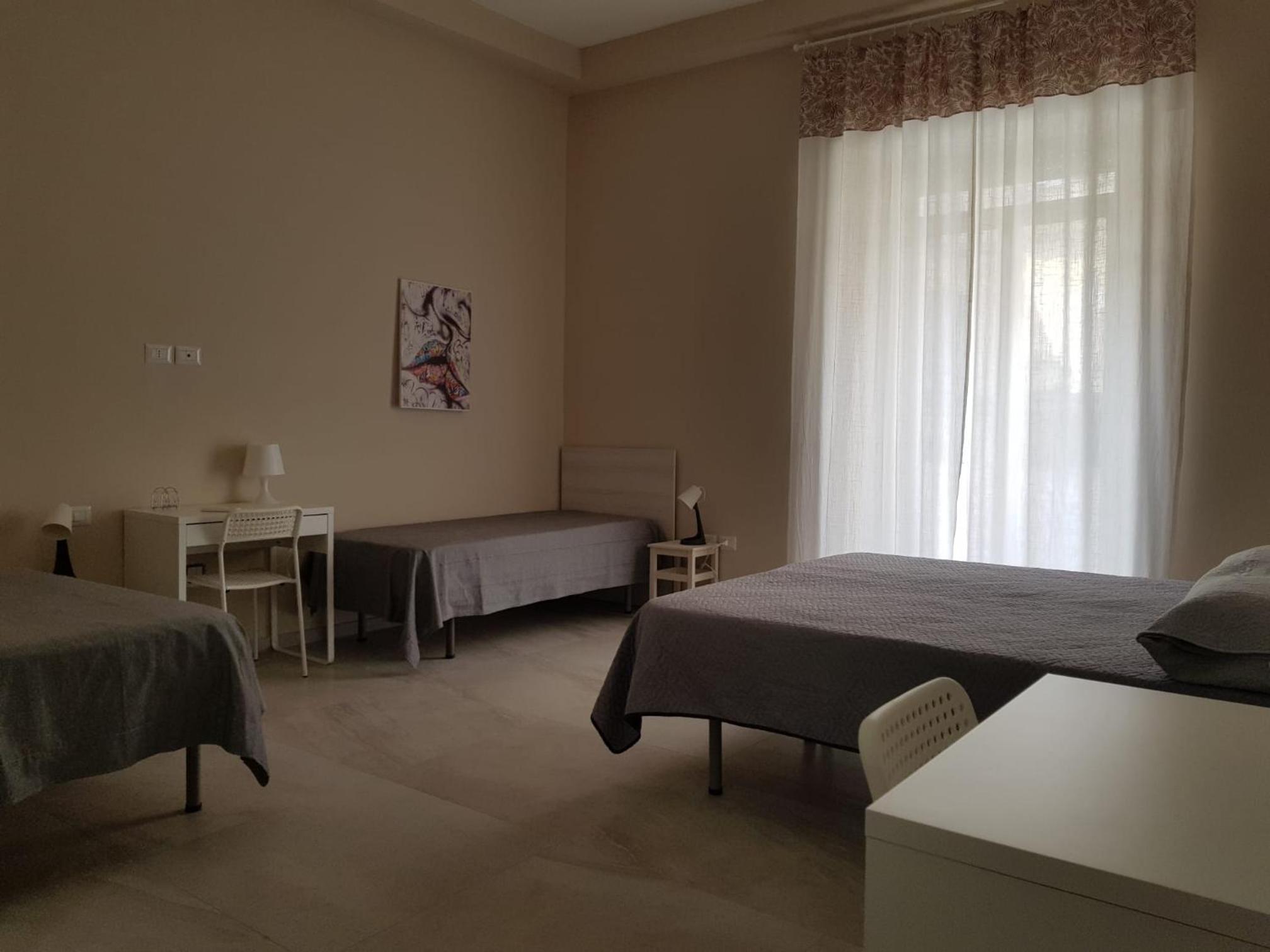 Quadruple Room with Private Bathroom