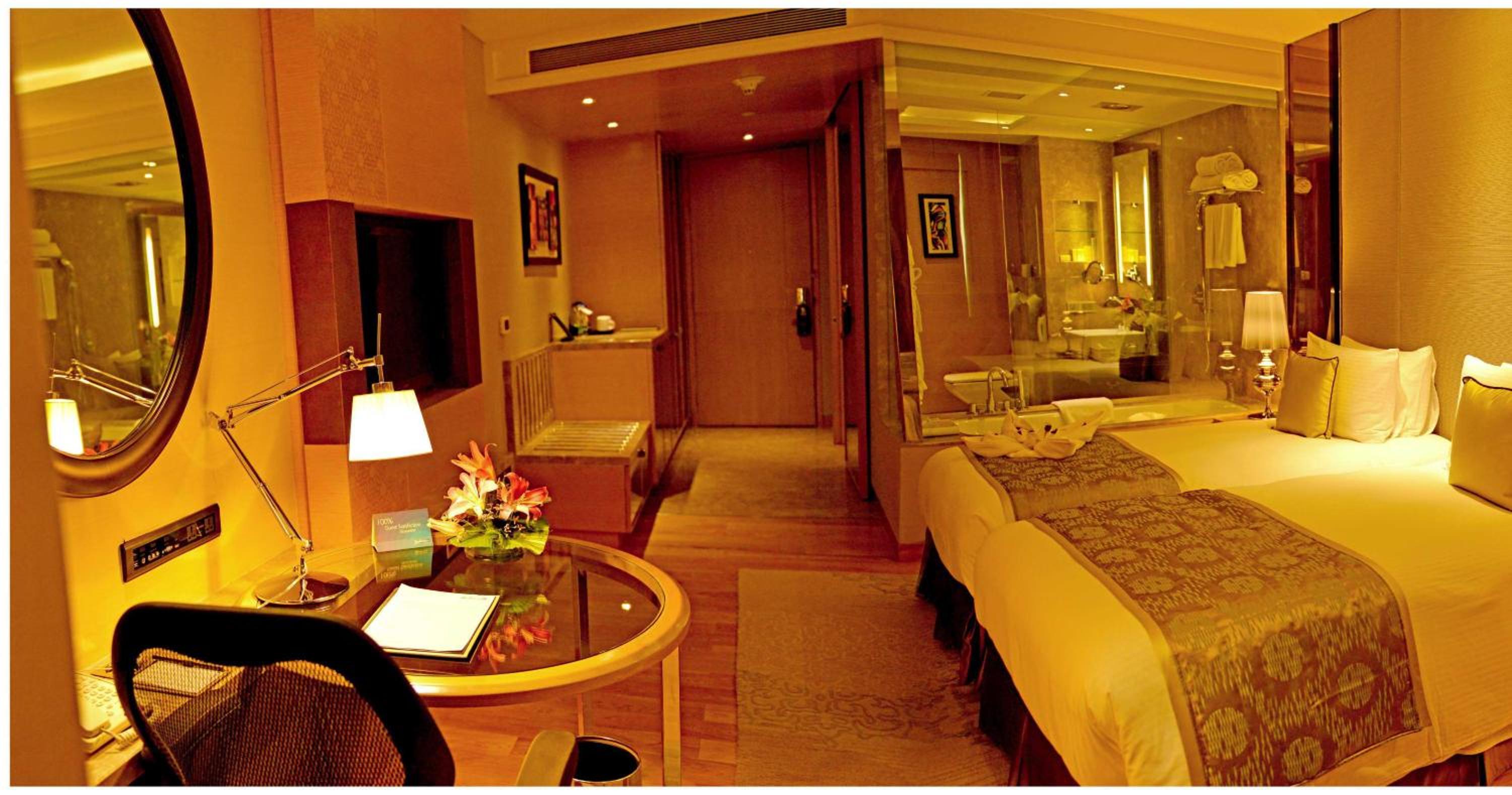 Business Double or Twin Room with Bathtub – Non Smoking Room with 02 beer or 02 Pegs(IMFL) or 02 Mocktails and 02 pcs laundry, , Complimentary INR 500 Hotel Credit redeemable on Food & Soft Beverages, 50% off on Mini Bar Business Double or Twin Room with Bathtub – Non Smoking Room with 02 beer or 02 Pegs(IMFL) or 02 Mocktails and 02 pcs laundry, , Complimentary INR 500 Hotel Credit redeemable on Food & Soft Beverages, 50% off on Mini Bar