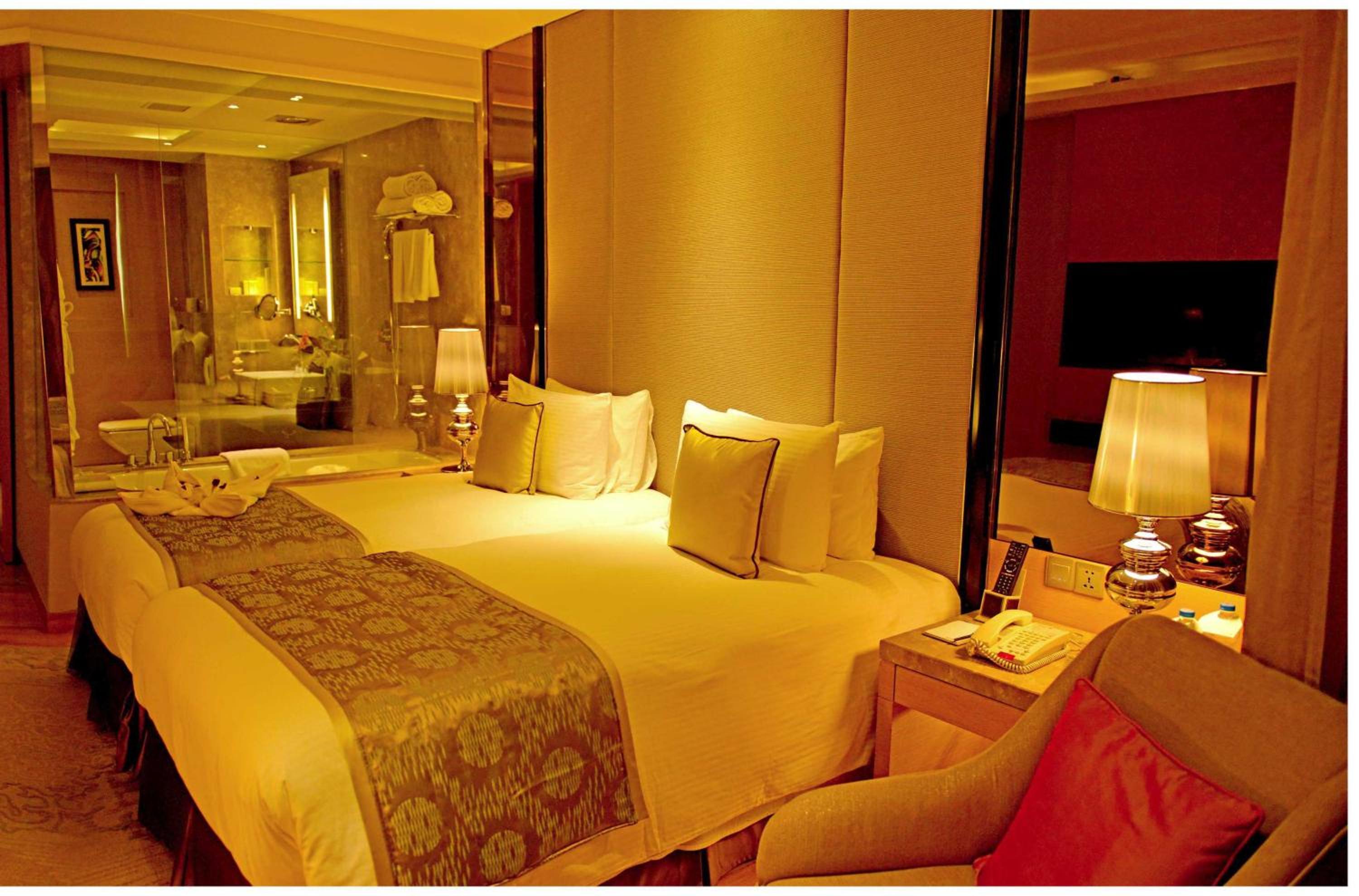 Business Double or Twin Room with Bathtub – Non Smoking Room with 02 beer or 02 Pegs(IMFL) or 02 Mocktails and 02 pcs laundry, , Complimentary INR 500 Hotel Credit redeemable on Food & Soft Beverages, 50% off on Mini Bar Business Double or Twin Room with Bathtub – Non Smoking Room with 02 beer or 02 Pegs(IMFL) or 02 Mocktails and 02 pcs laundry, , Complimentary INR 500 Hotel Credit redeemable on Food & Soft Beverages, 50% off on Mini Bar