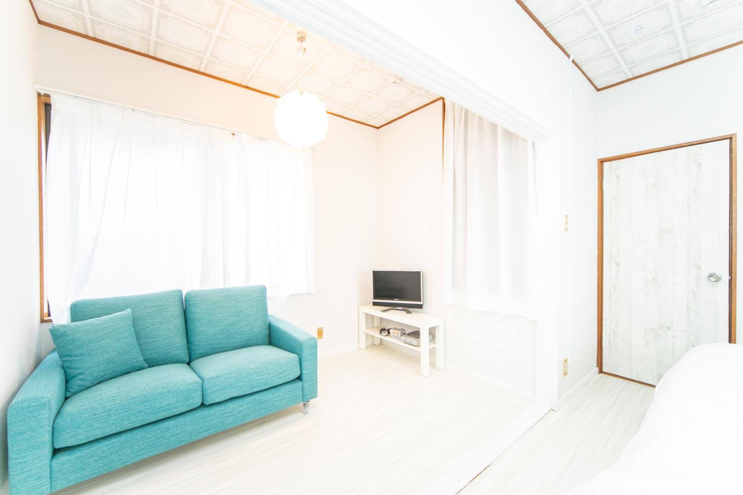 Three-Bedroom House - Photo 20