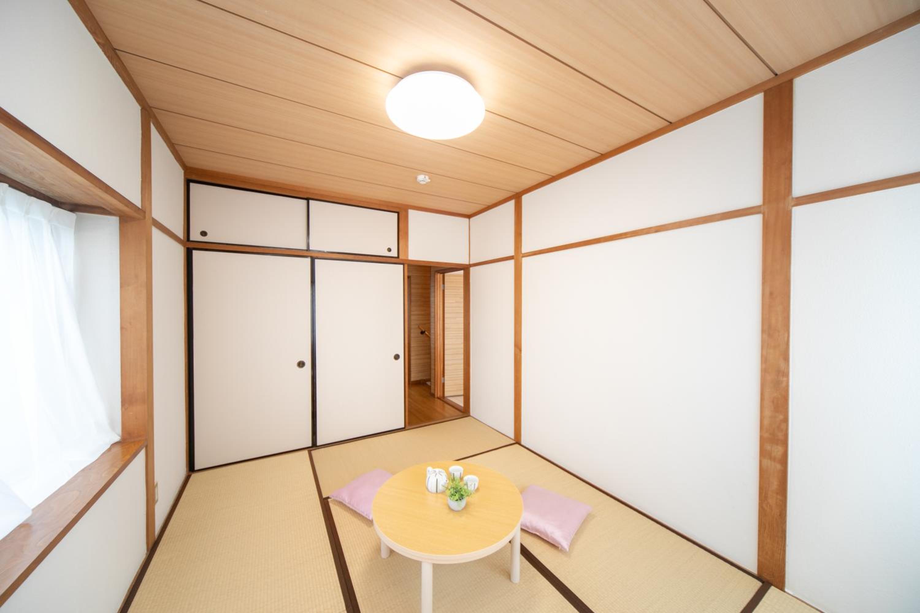 Three-Bedroom House - Photo 18