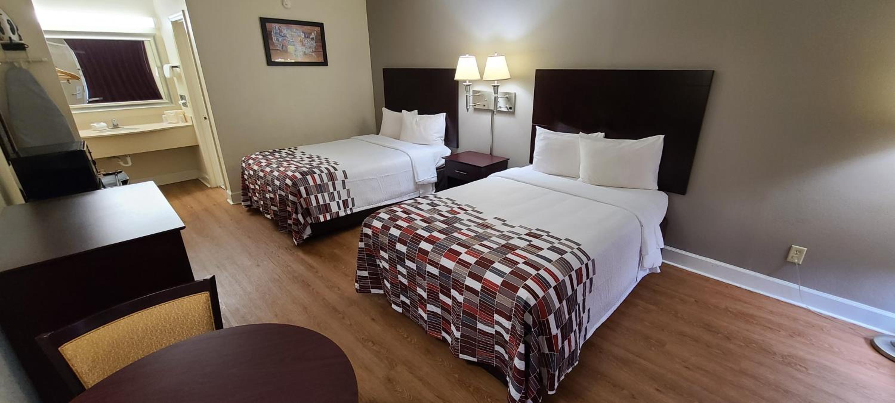 Deluxe Room with Two Double Beds Non-Smoking - Photo 1