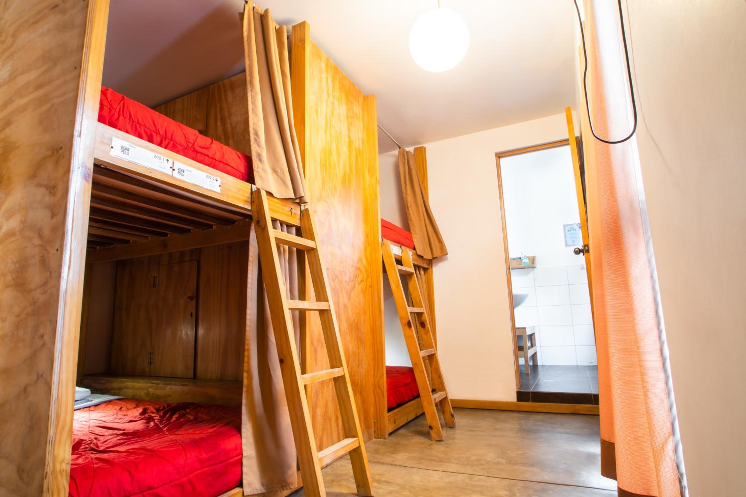 Bed in 8-Bed Dormitory Room with Private Bathroom