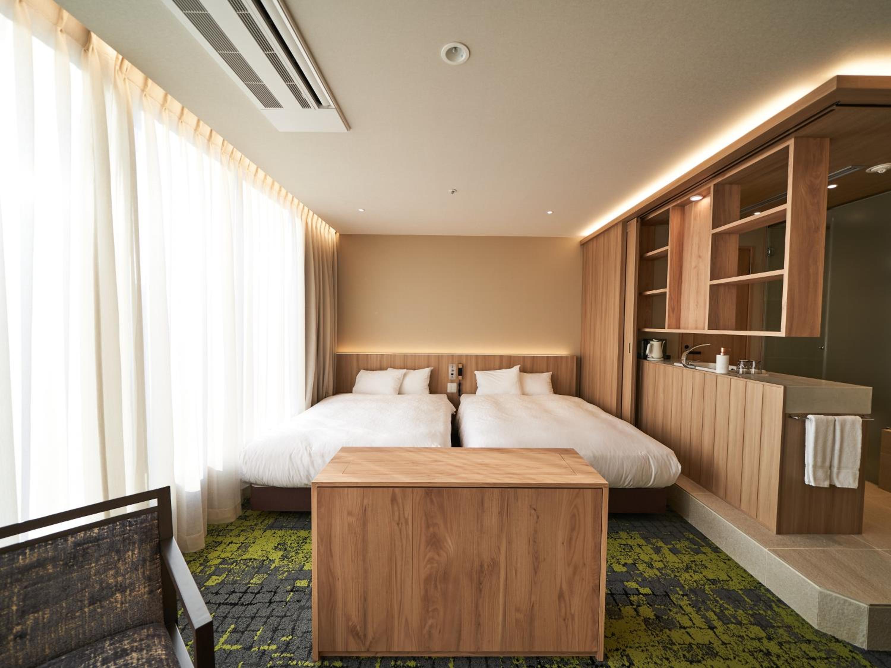 Deluxe Twin Room with Extra Bed - Photo 7