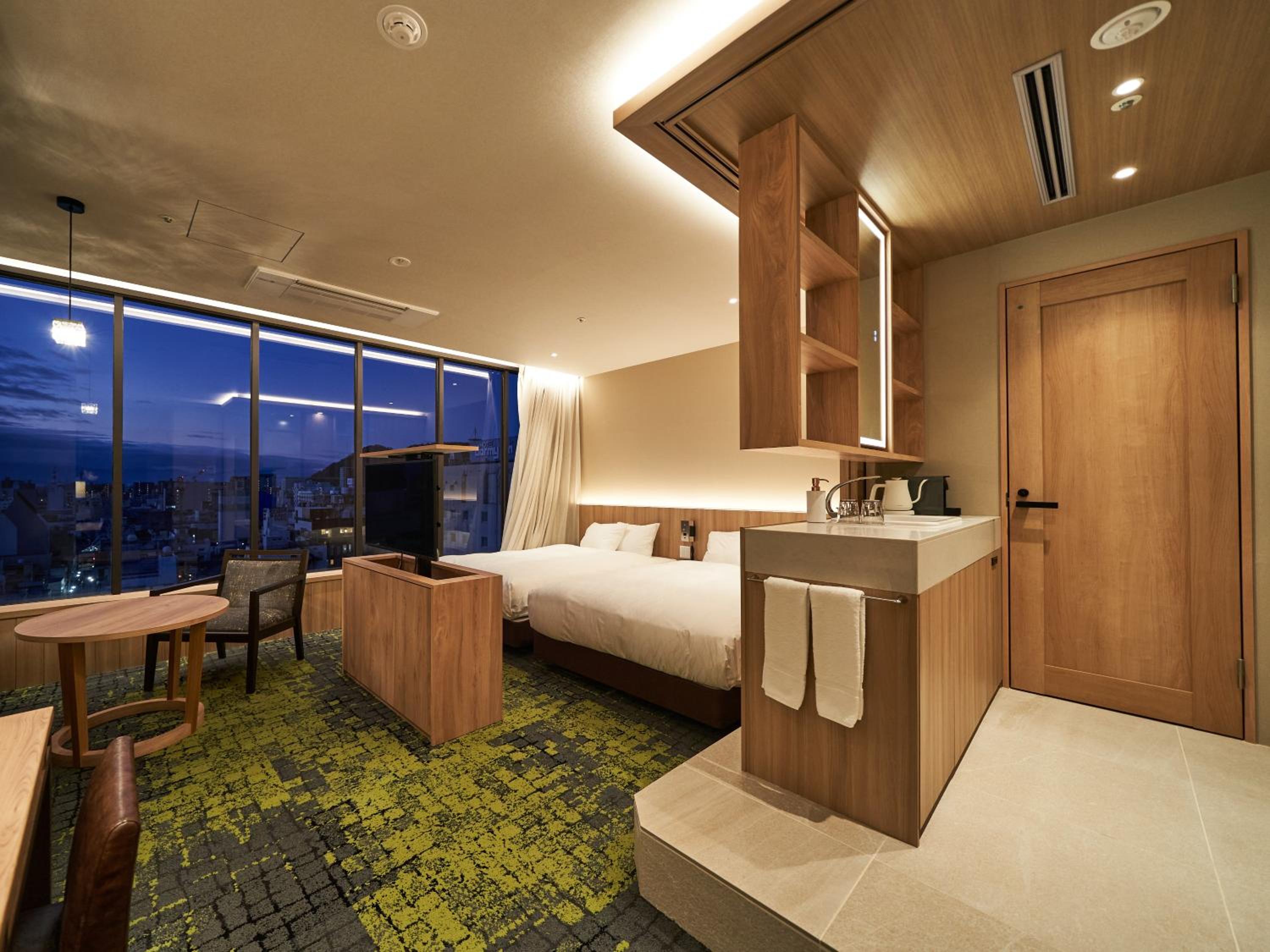Deluxe Twin Room with Extra Bed - Photo 5