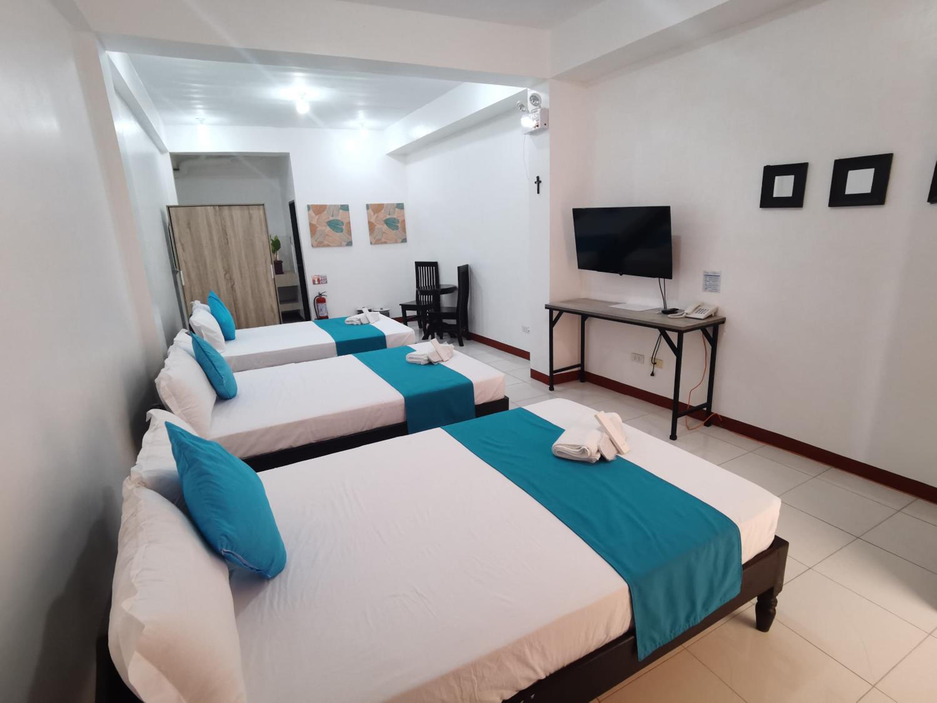 Deluxe Triple Room - Photo 1